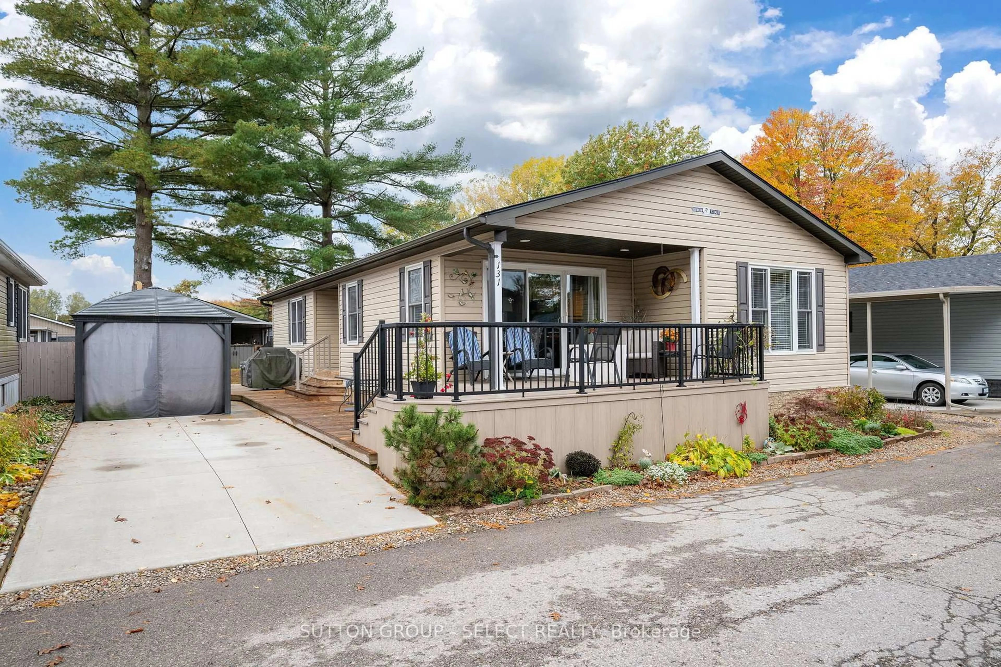 Home with vinyl exterior material, street for 22790 Amiens Rd #131, Middlesex Centre Ontario N0L 1R0