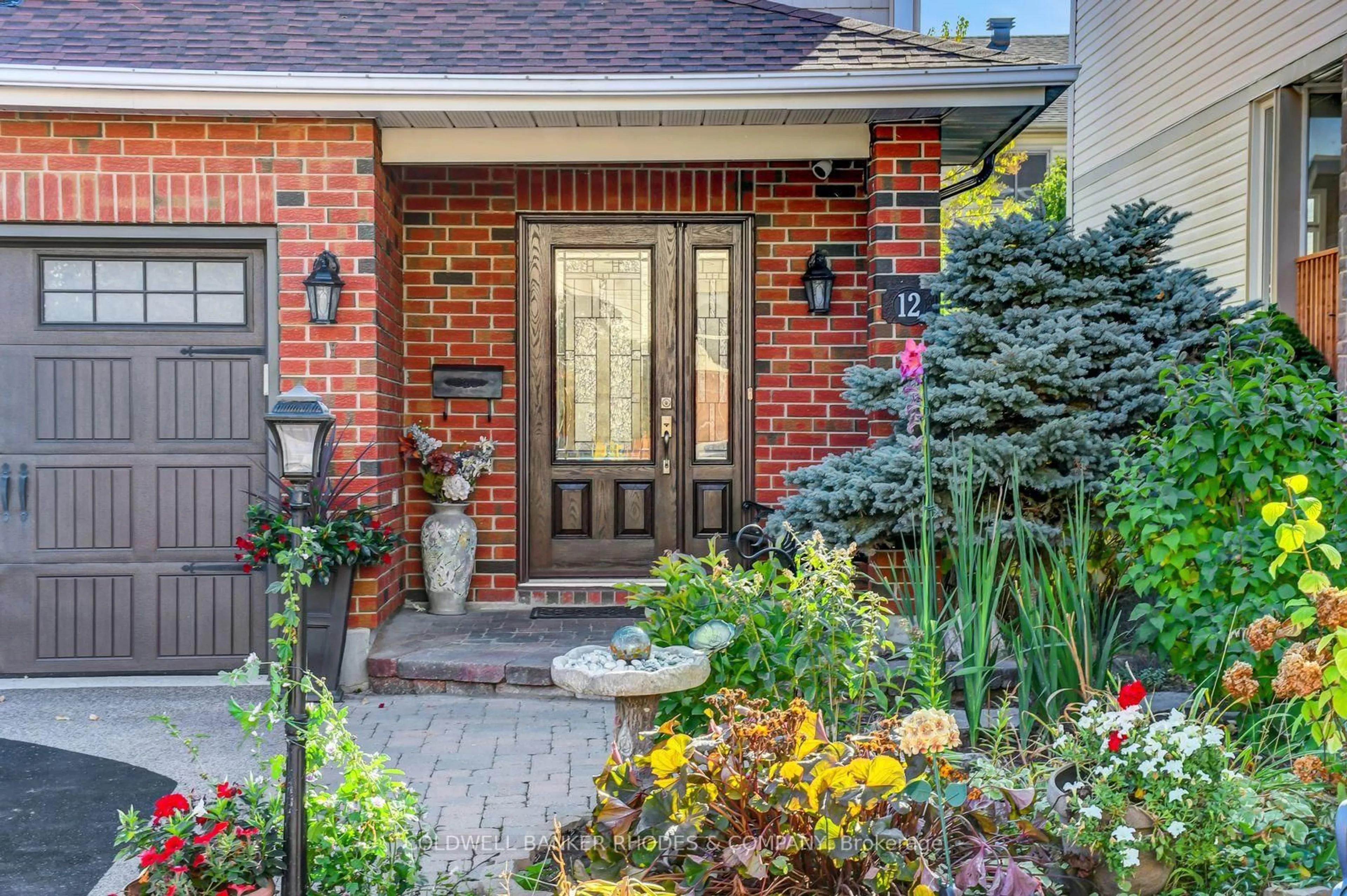 Home with brick exterior material, street for 12 Bramblegrove Cres, Ottawa Ontario K1T 3G3