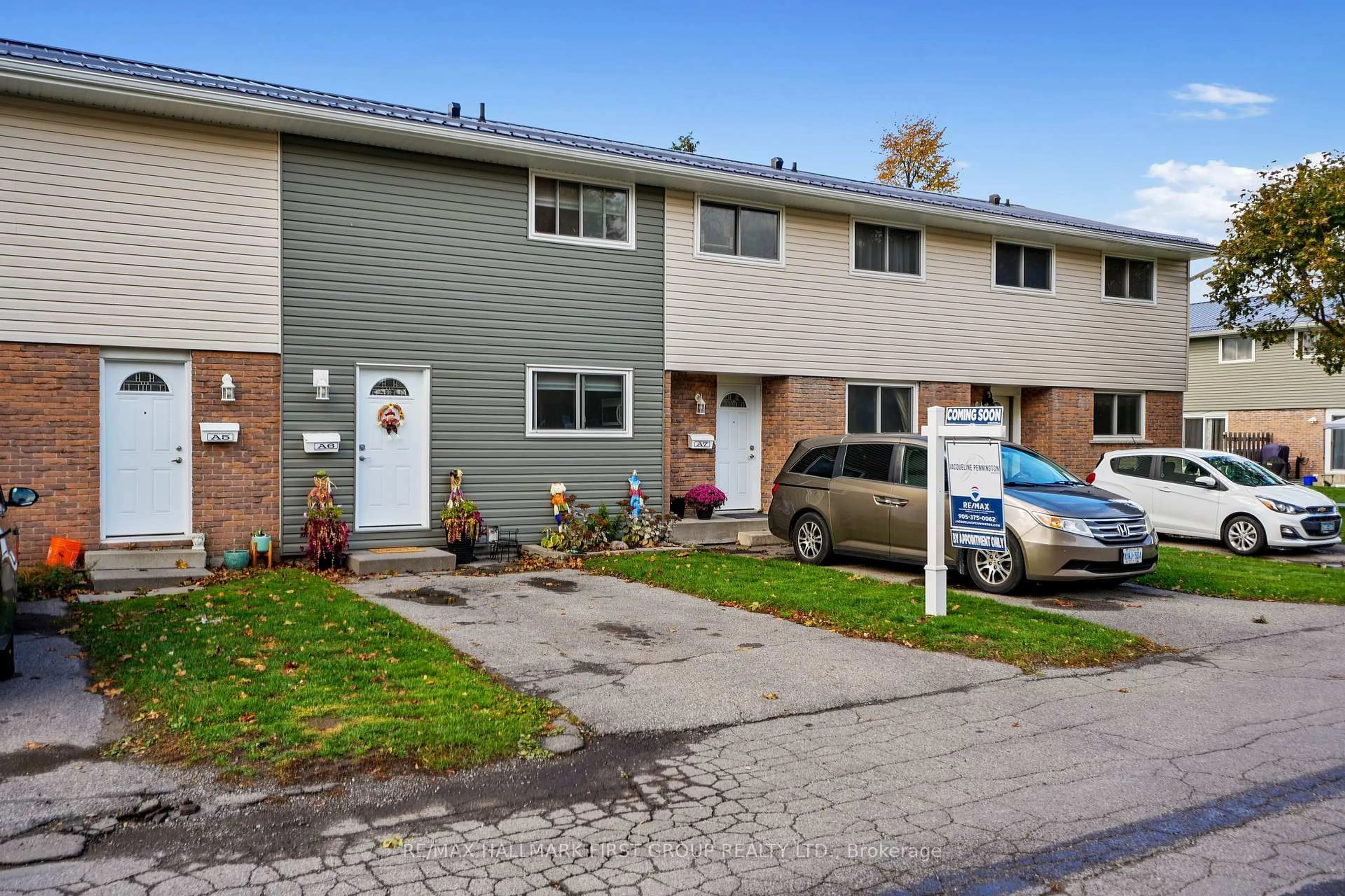 Home with vinyl exterior material, street for 400 Westwood Dr #A6, Cobourg Ontario K9A 2B6