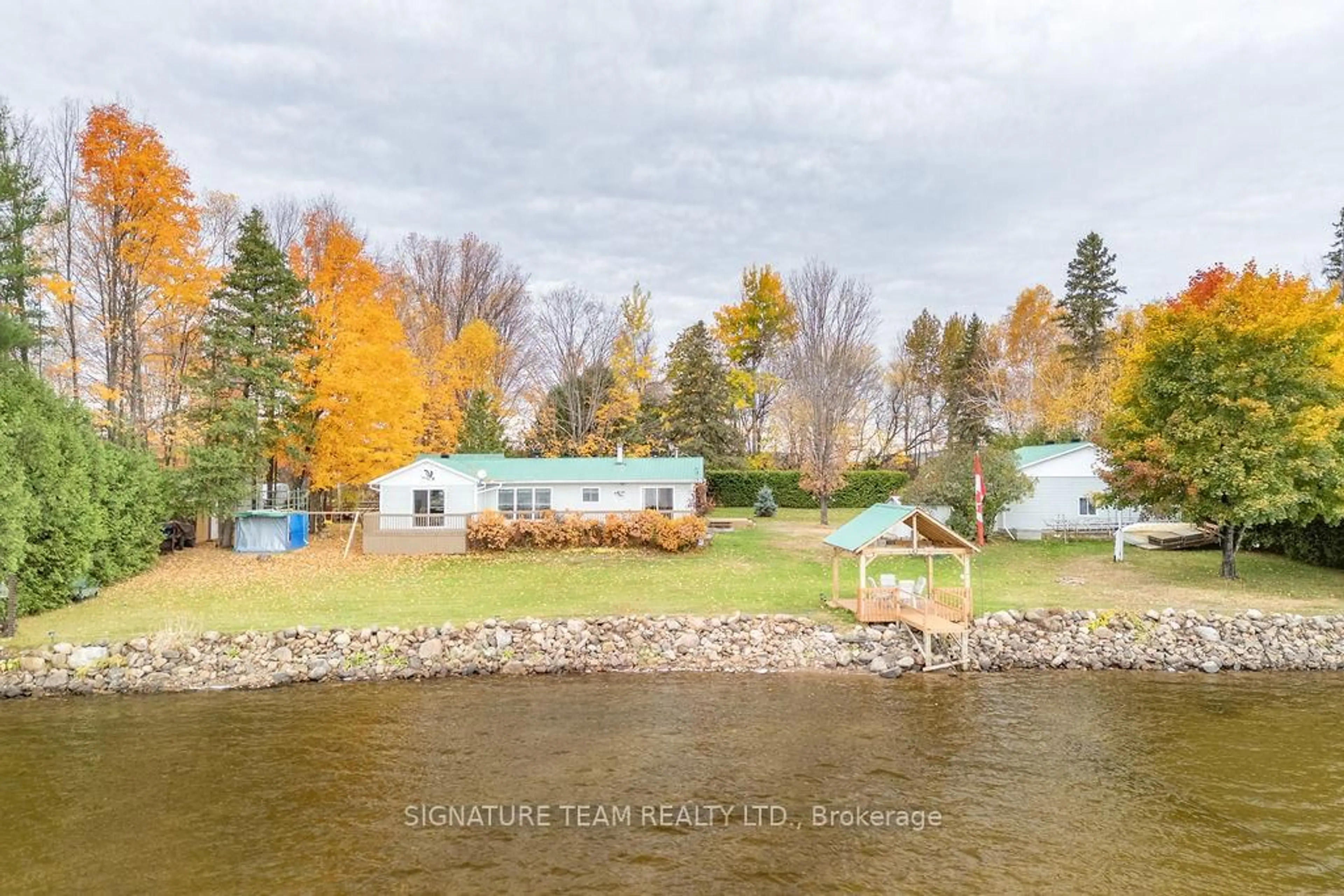 A pic from outside/outdoor area/front of a property/back of a property/a pic from drone, water/lake/river/ocean view for 347 Black Point Rd, Golden Lake Ontario K0J 1X0