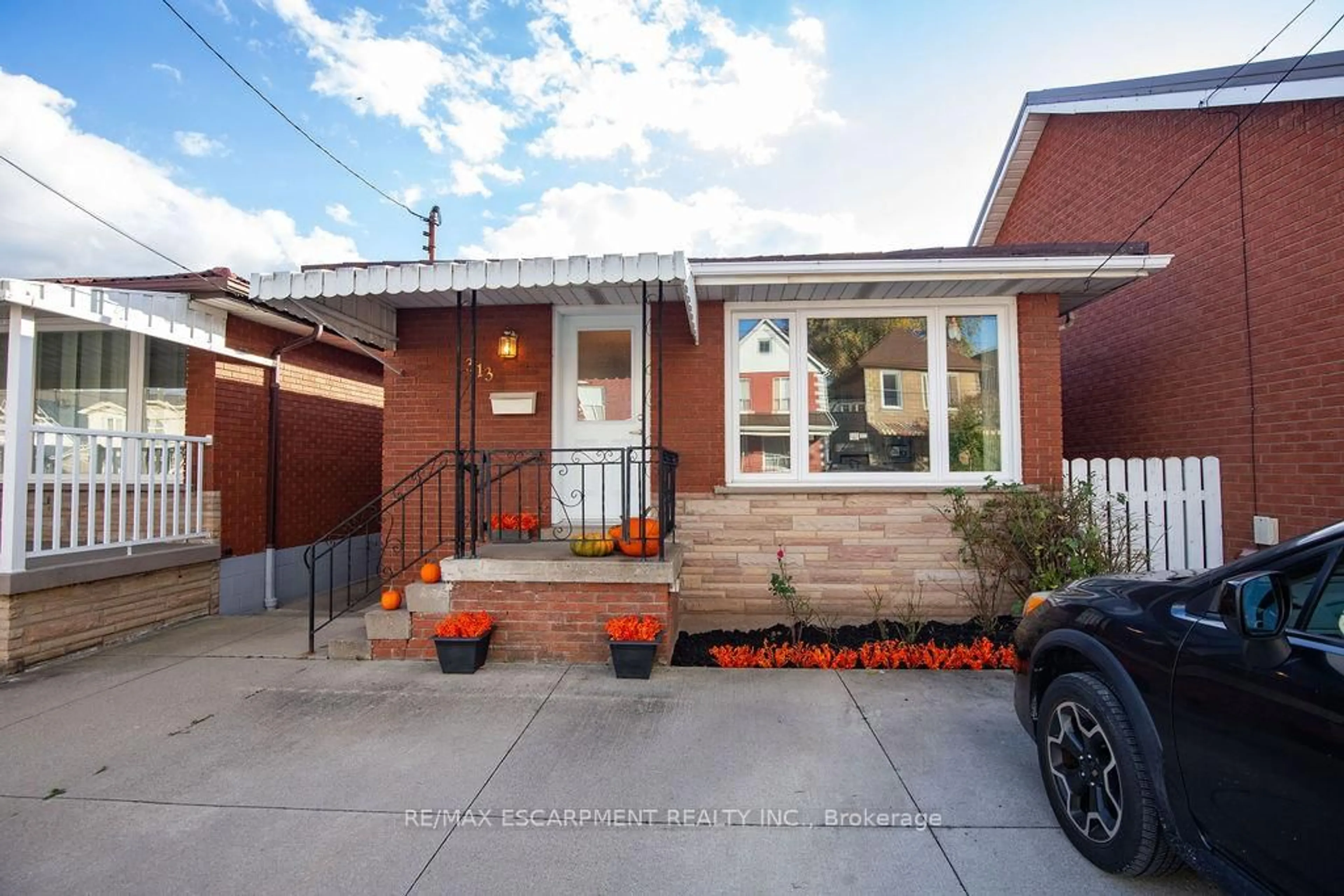 Home with brick exterior material, street for 313 Barton St, Hamilton Ontario L8R 2J3
