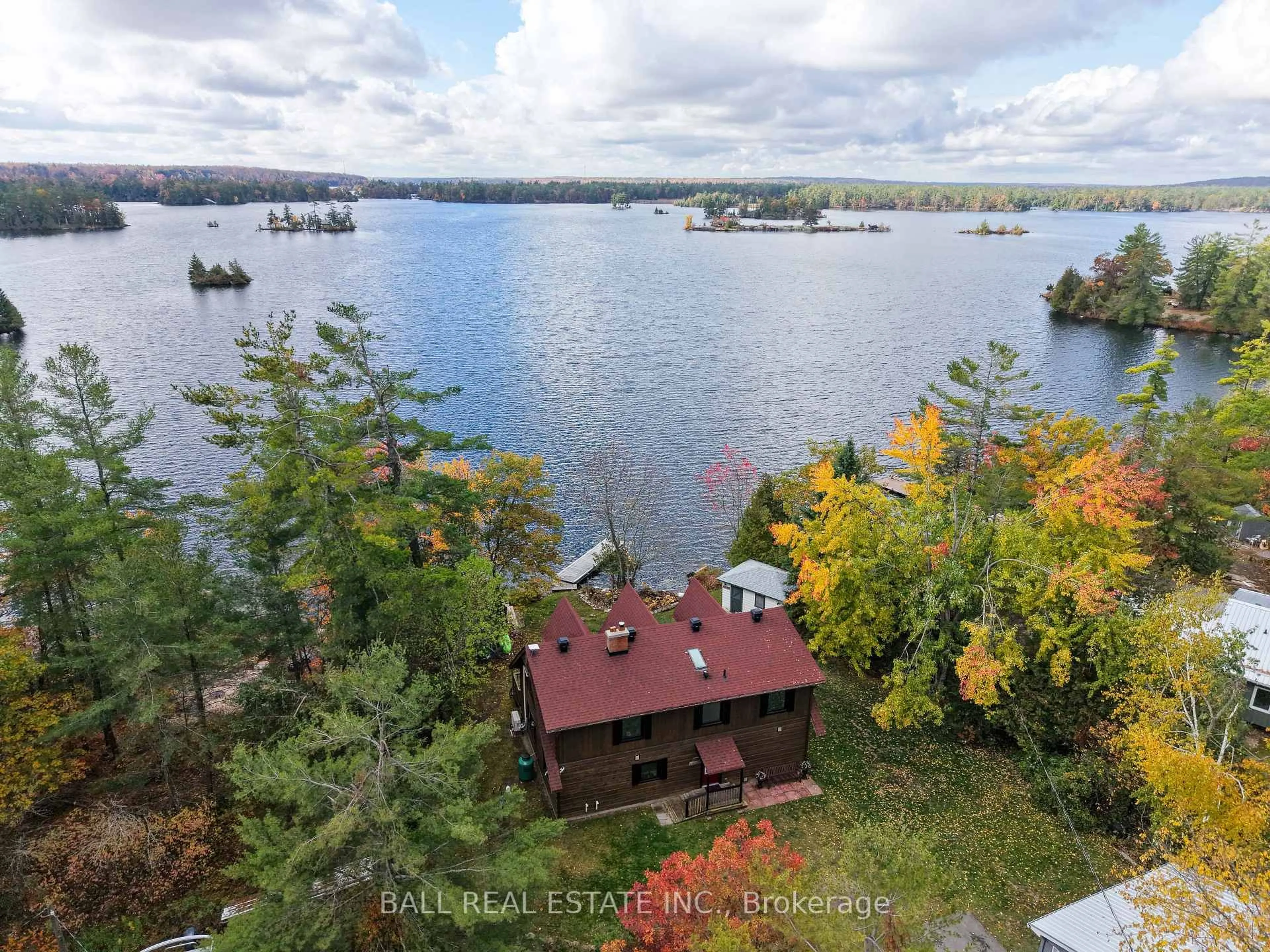 A pic from outside/outdoor area/front of a property/back of a property/a pic from drone, water/lake/river/ocean view for 36 Fire Route 7A, Trent Lakes Ontario K0L 1J0