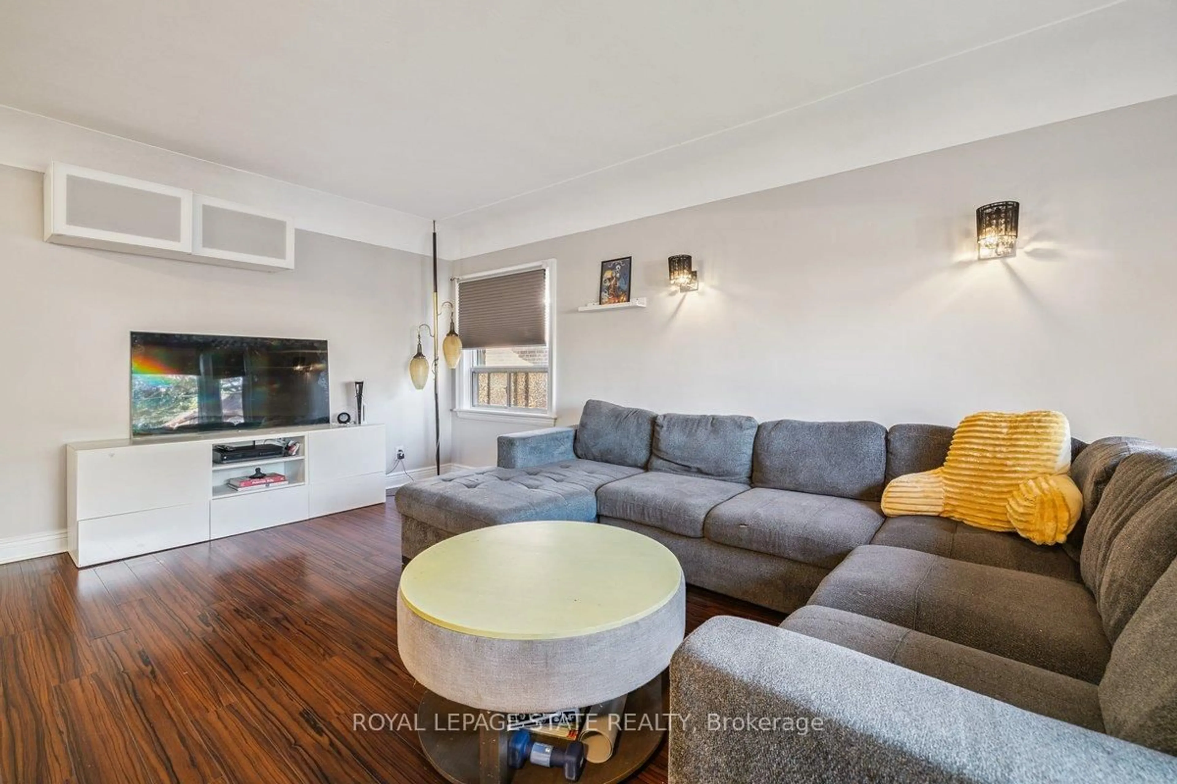 Living room with furniture, wood/laminate floor for 8 Wavell Ave, Hamilton Ontario L9A 2T2