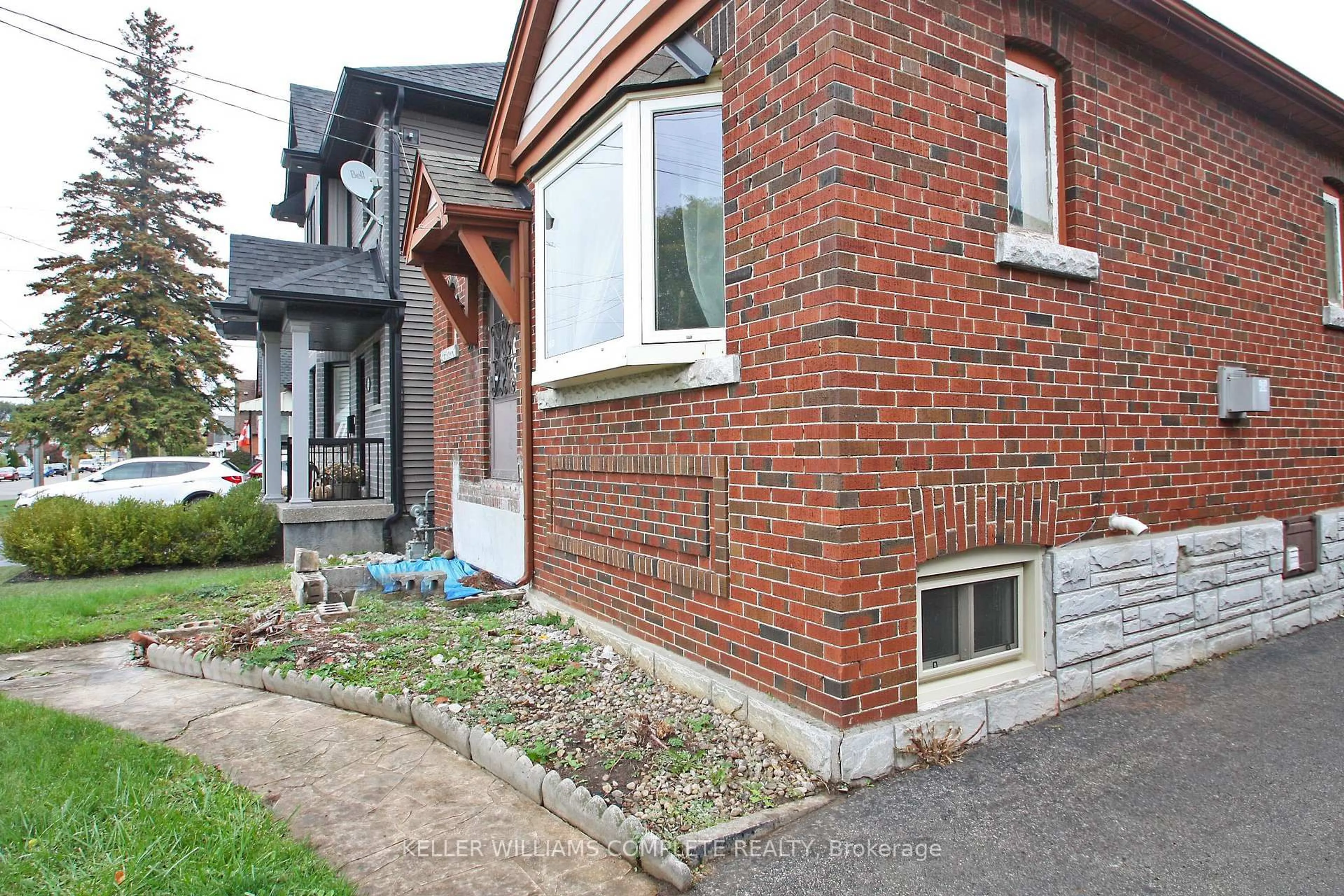 Home with brick exterior material, street for 35 Barons Ave, Hamilton Ontario L8K 2Y1
