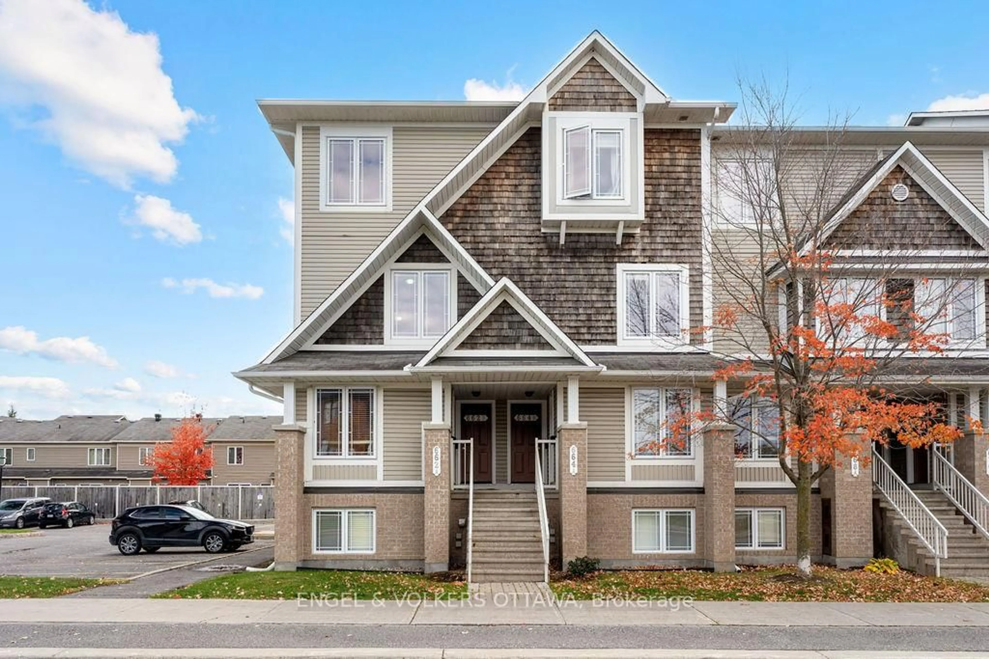 Home with brick exterior material, street for 662B Chapman Mills Dr, Ottawa Ontario K2J 0V4