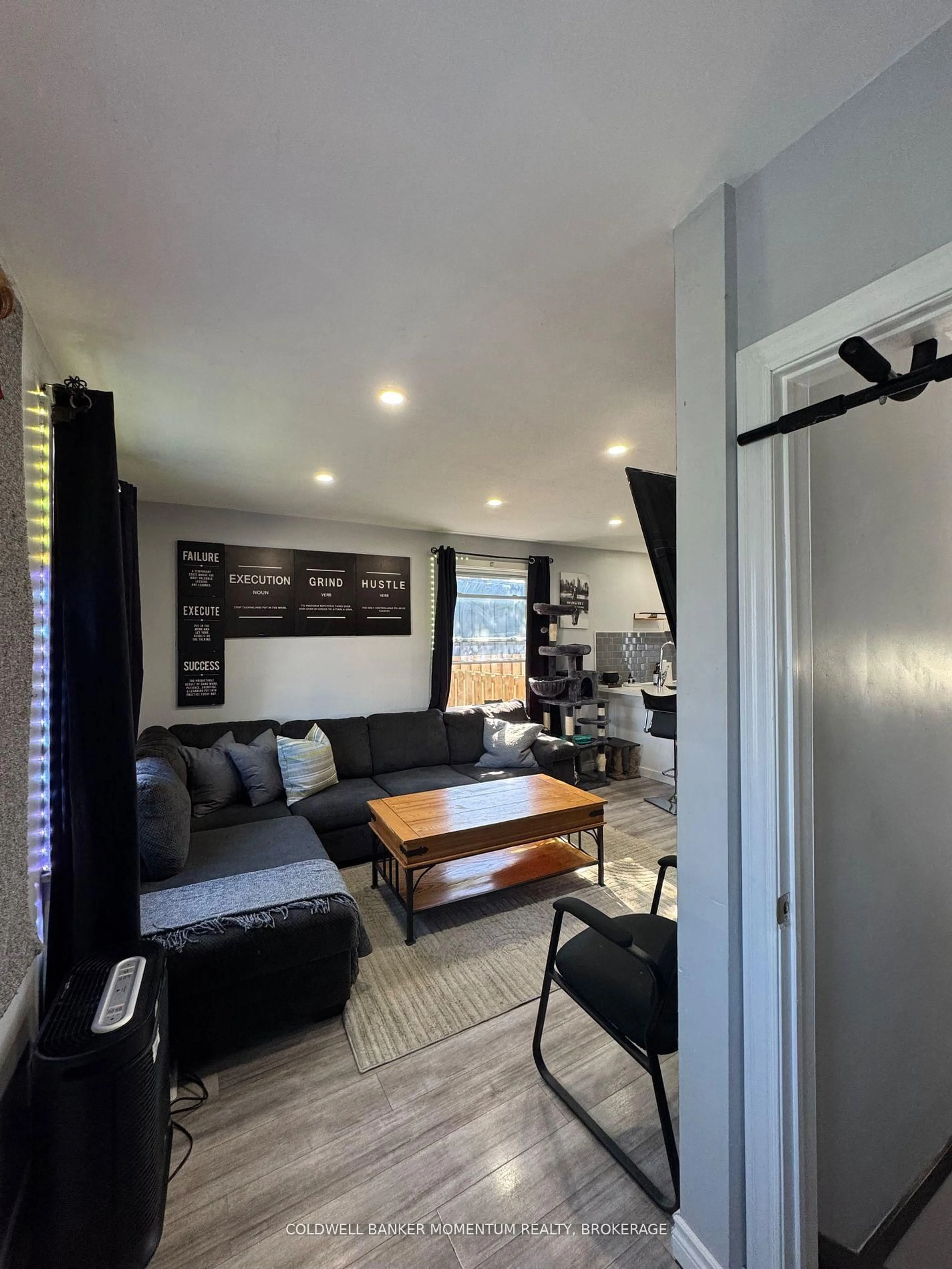 Living room with furniture, unknown for 16 Princess St, St. Catharines Ontario L2P 2P9