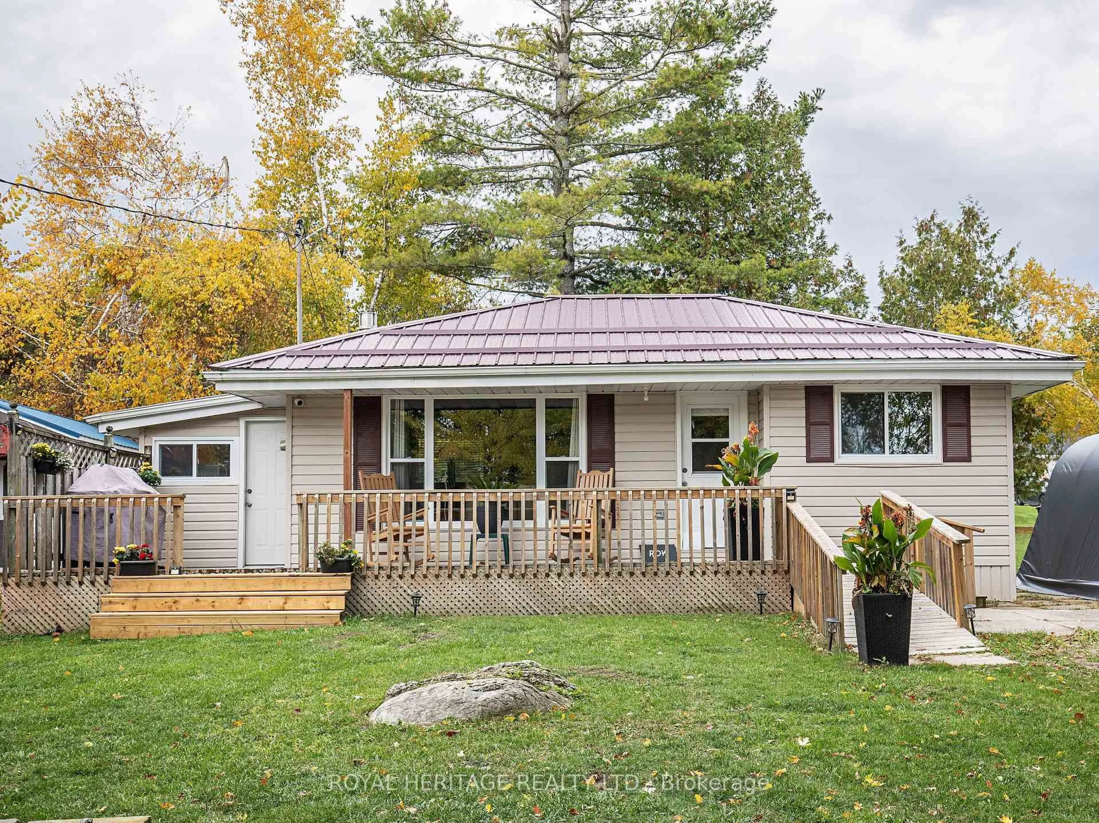 Home with vinyl exterior material, street for 203 Crosby Dr, Kawartha Lakes Ontario K0M 1A0