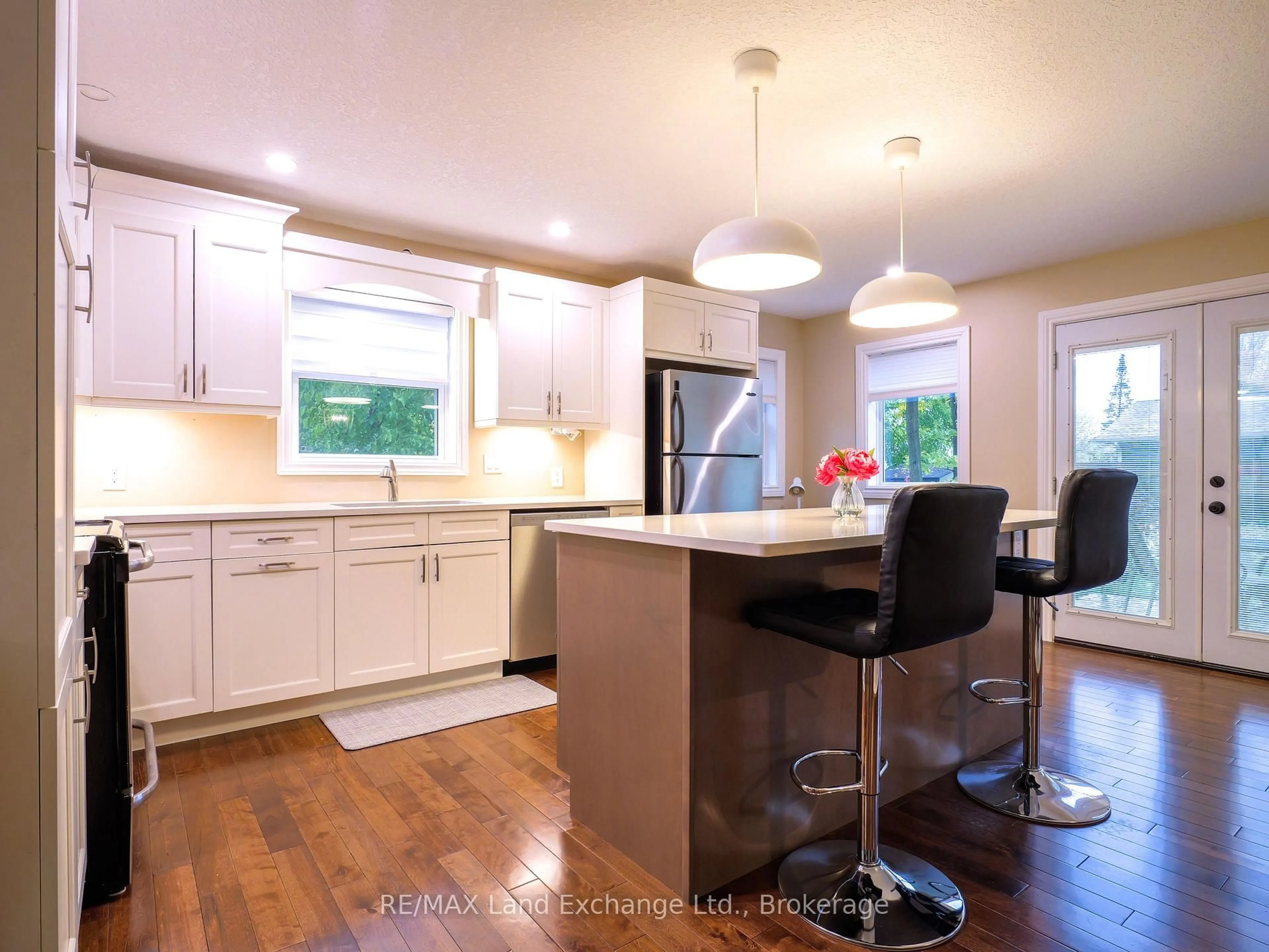 Open concept kitchen, wood/laminate floor for 749 Mill St, Saugeen Shores Ontario N0H 2C4