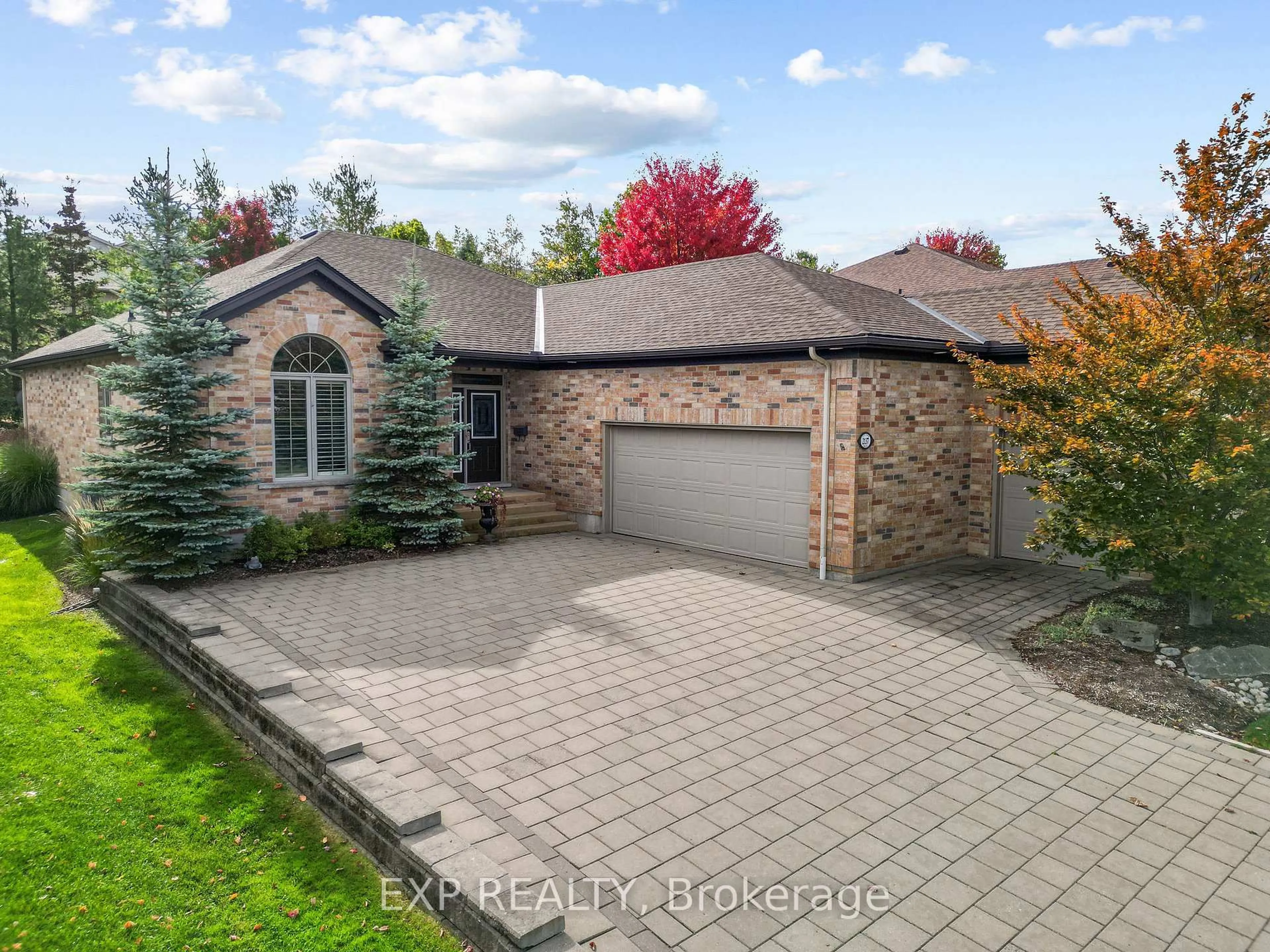 Home with brick exterior material, street for 2137 Jack Nash Dr, London South Ontario N6K 5R1