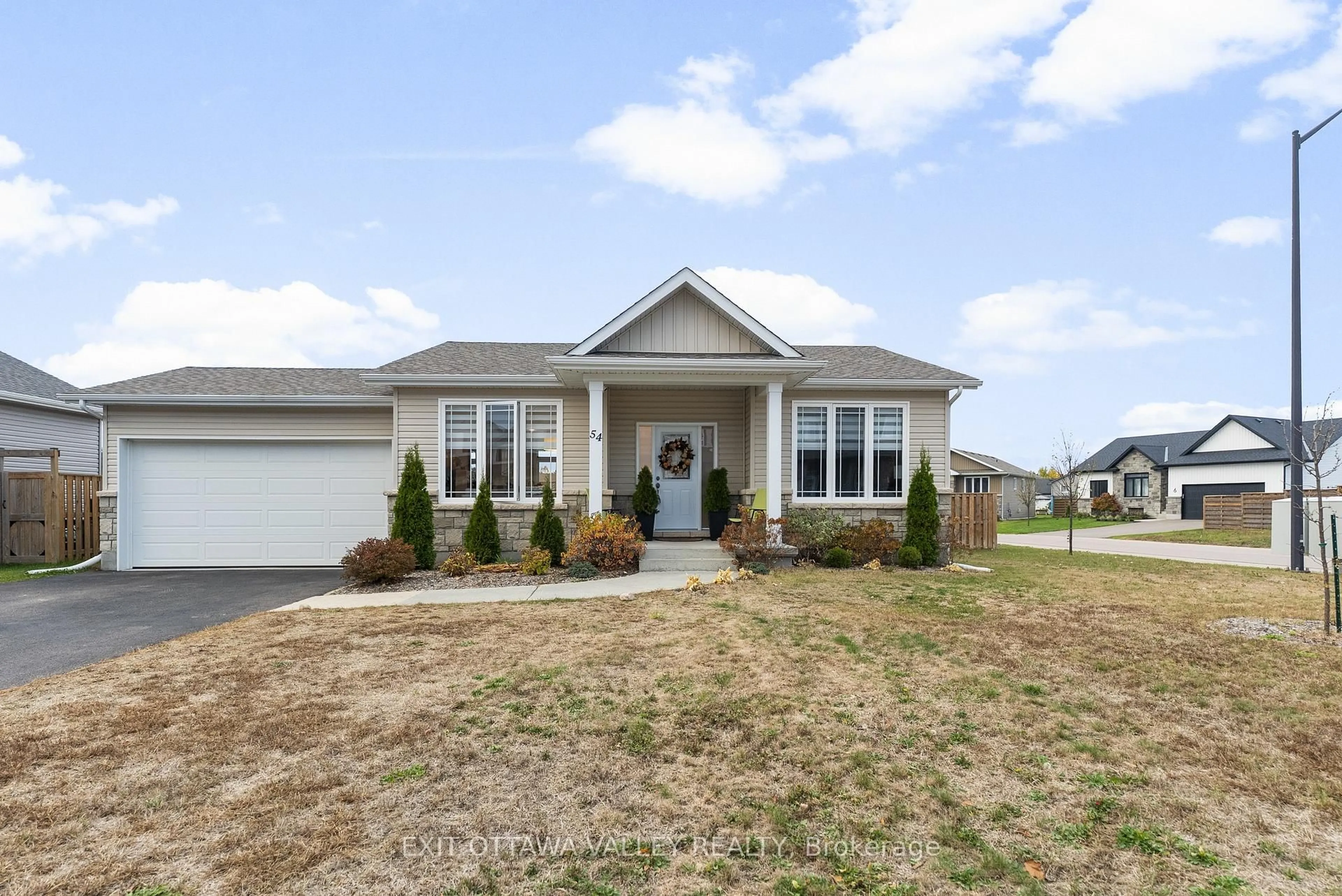 Home with vinyl exterior material, street for 54 Chad St, Petawawa Ontario K8H 0G8