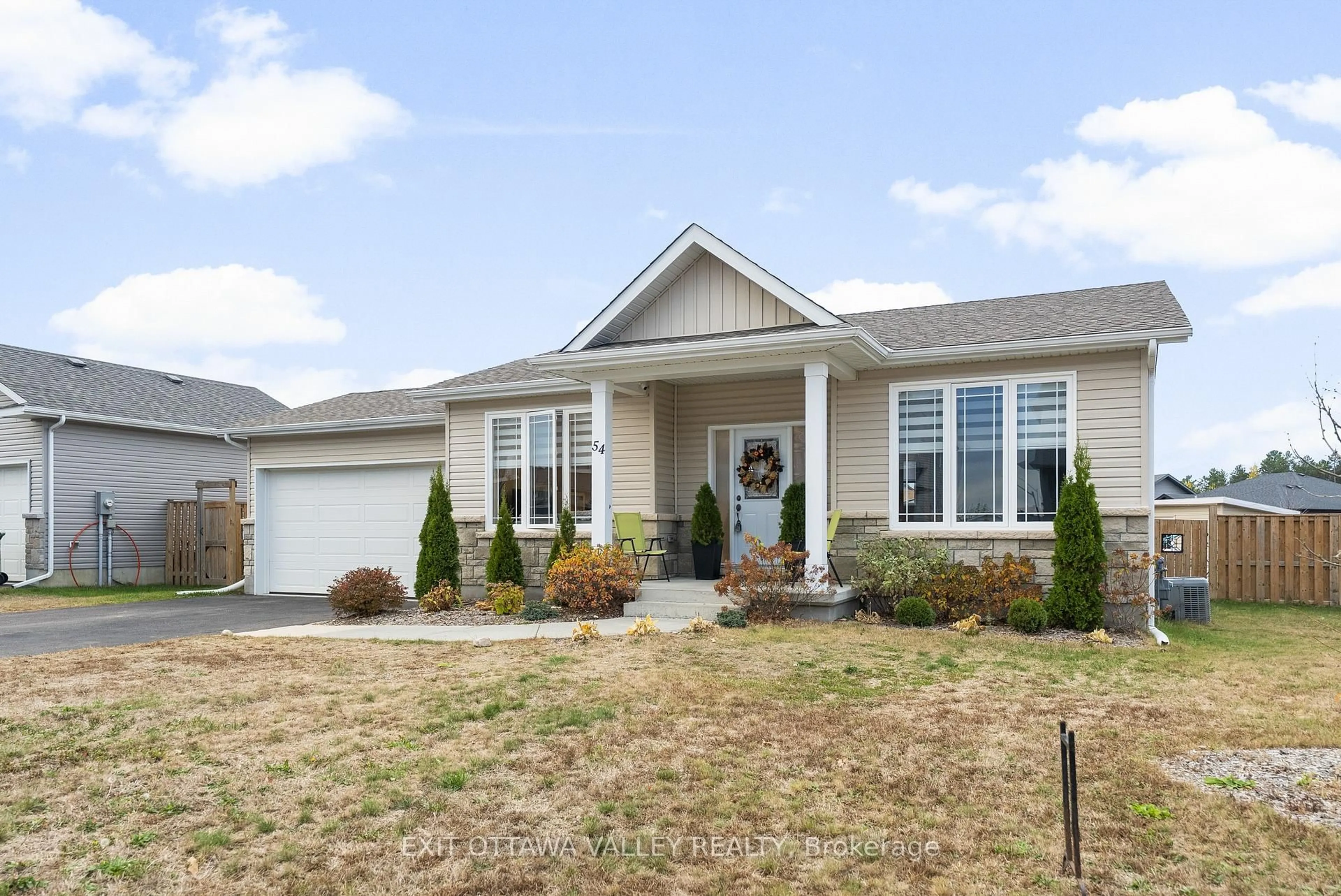 Home with vinyl exterior material, street for 54 Chad St, Petawawa Ontario K8H 0G8