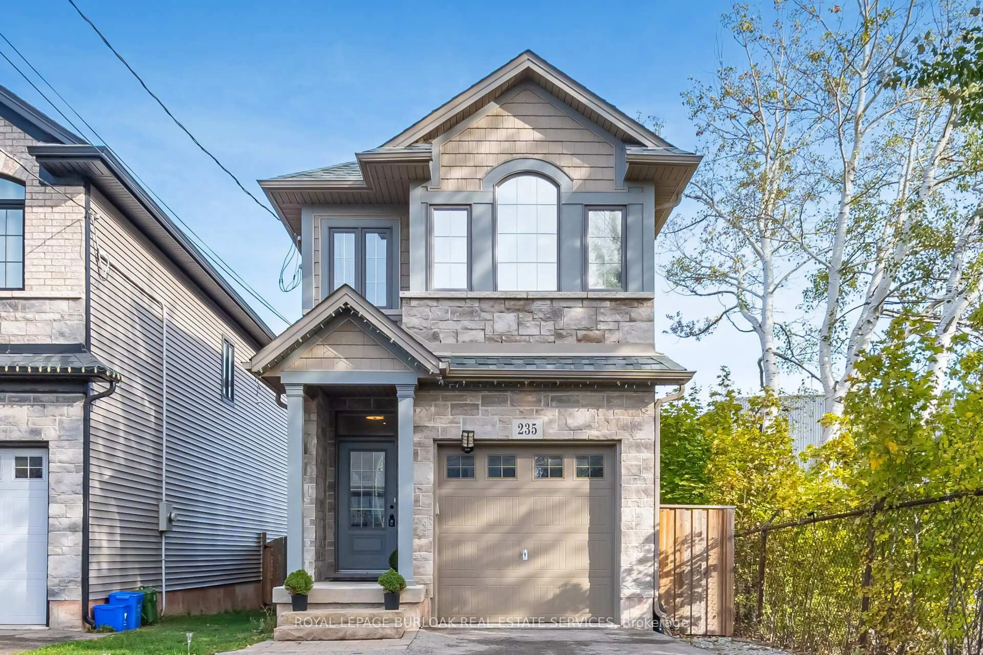 Home with brick exterior material, street for 235 Mead Ave, Hamilton Ontario L8H 3V6