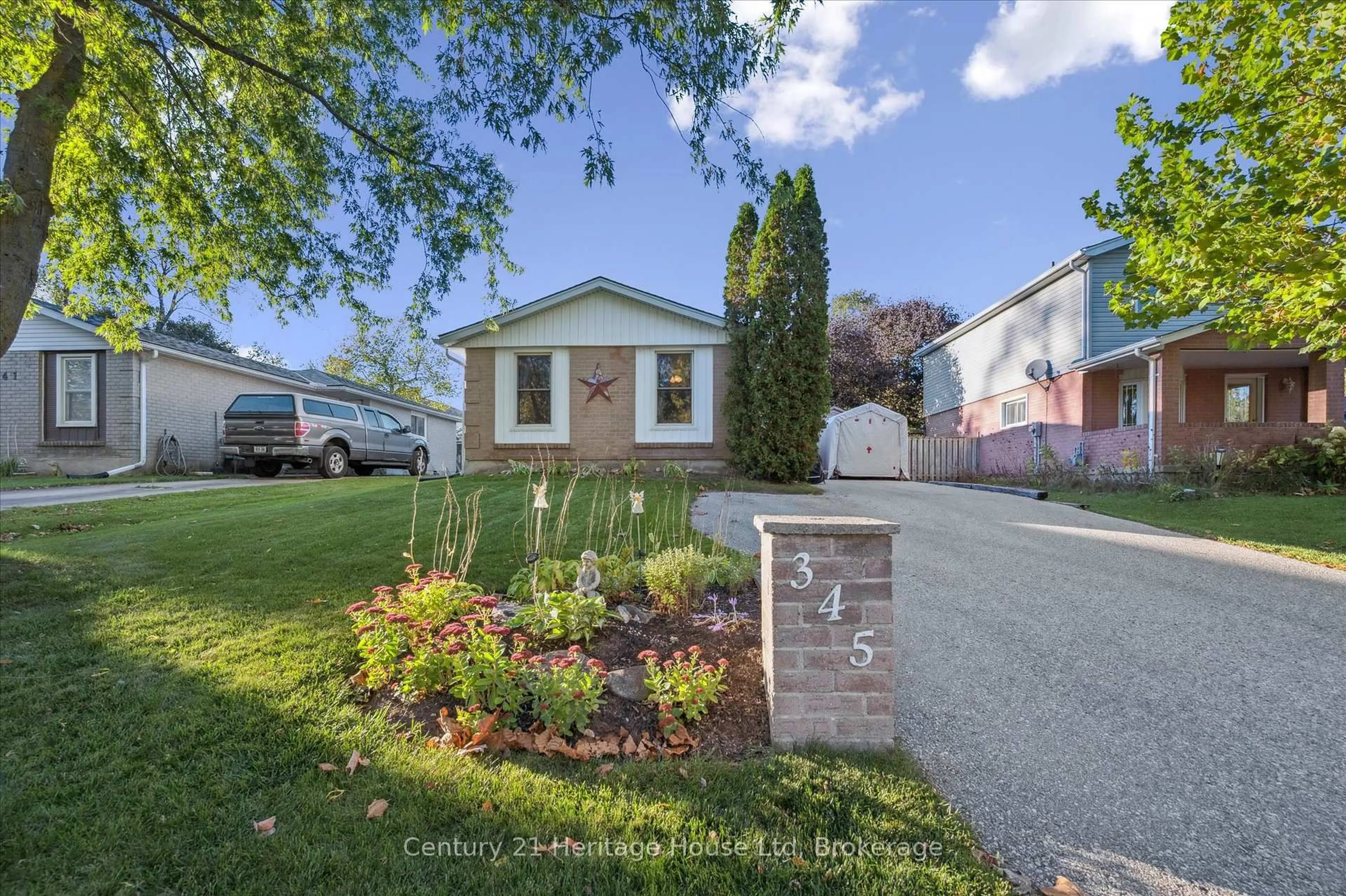 A pic from outside/outdoor area/front of a property/back of a property/a pic from drone, street for 345 Stornoway Dr, Centre Wellington Ontario N1M 3K9