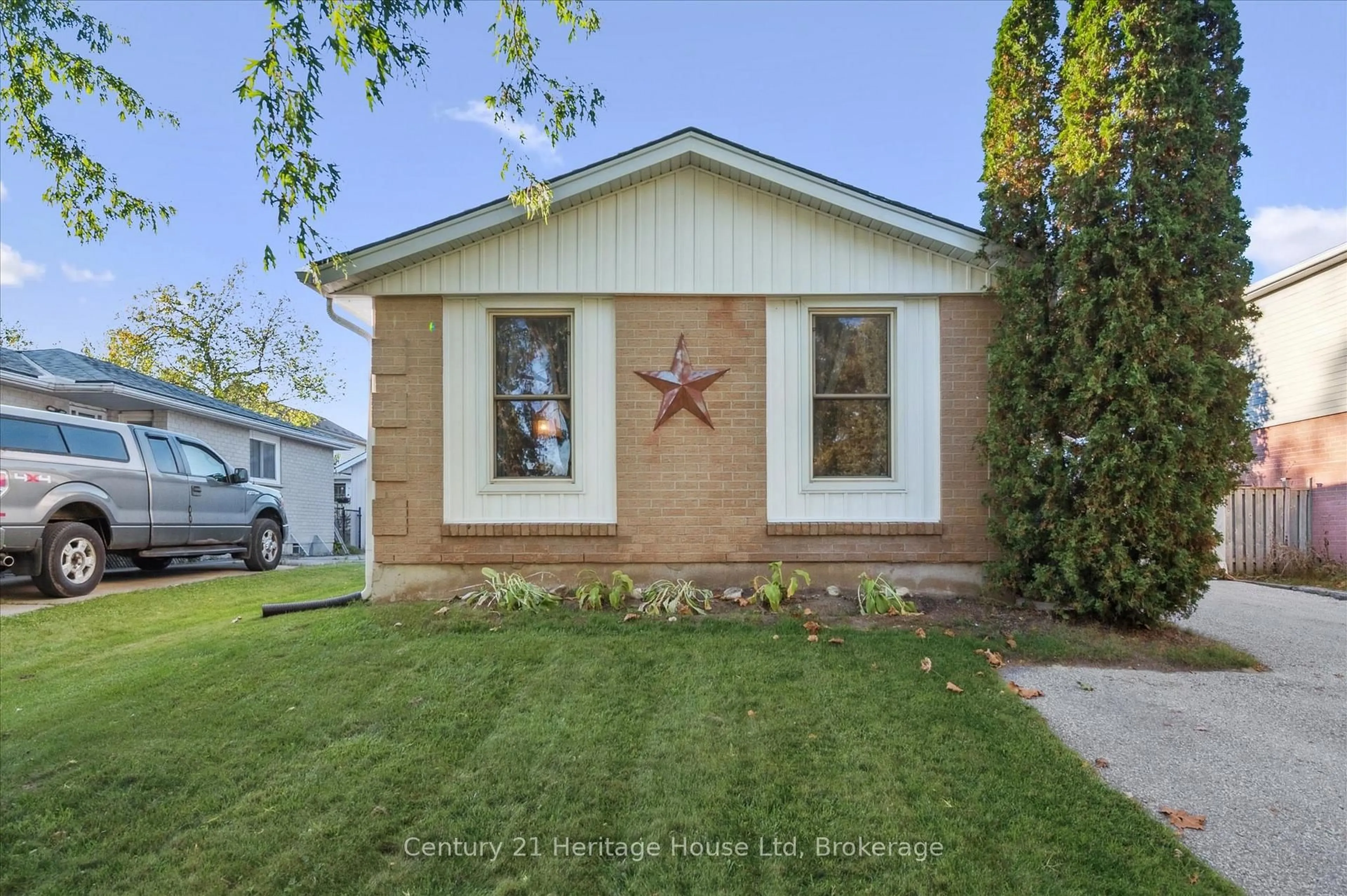 Home with vinyl exterior material, street for 345 Stornoway Dr, Centre Wellington Ontario N1M 3K9