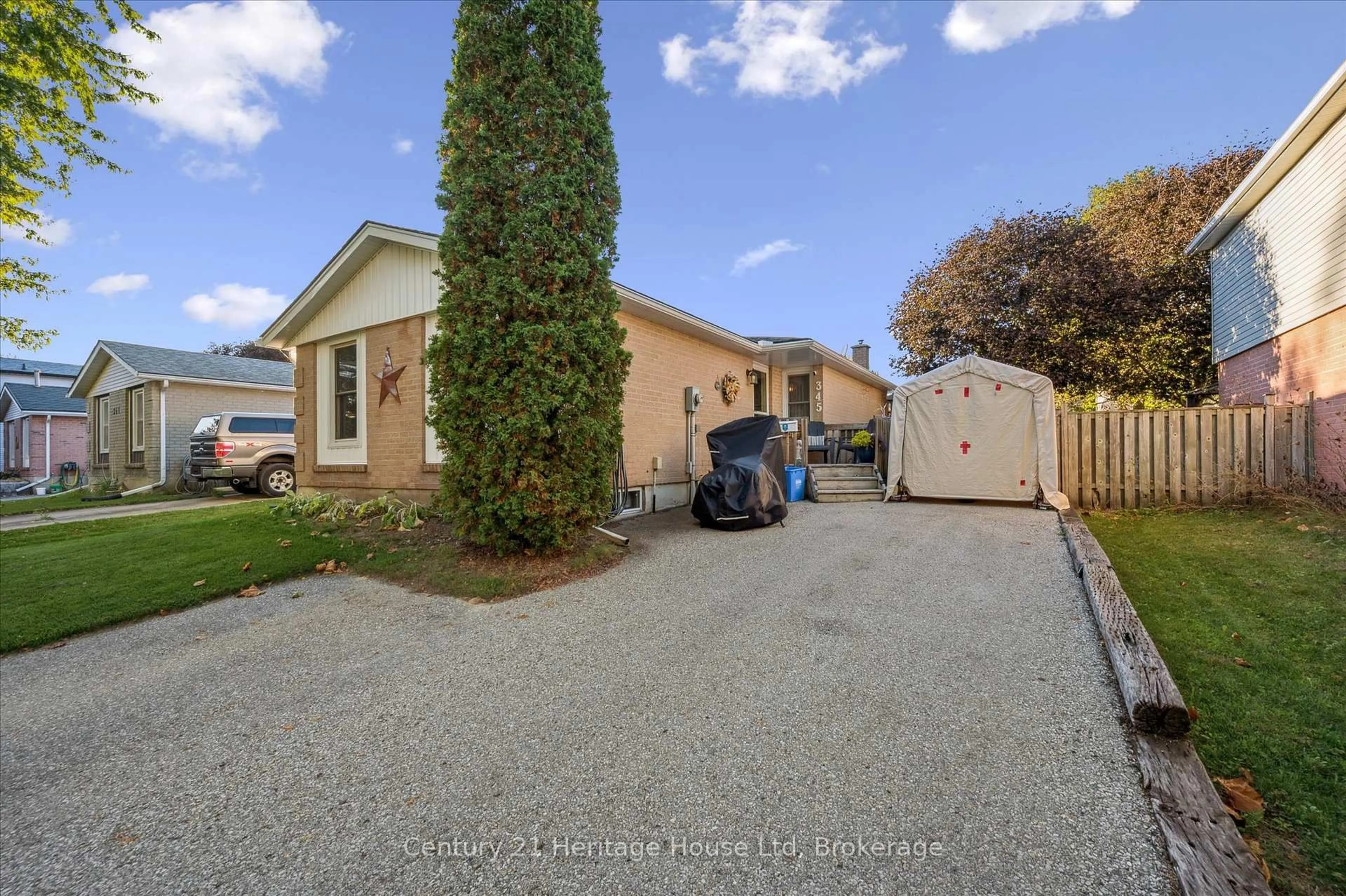 A pic from outside/outdoor area/front of a property/back of a property/a pic from drone, street for 345 Stornoway Dr, Centre Wellington Ontario N1M 3K9