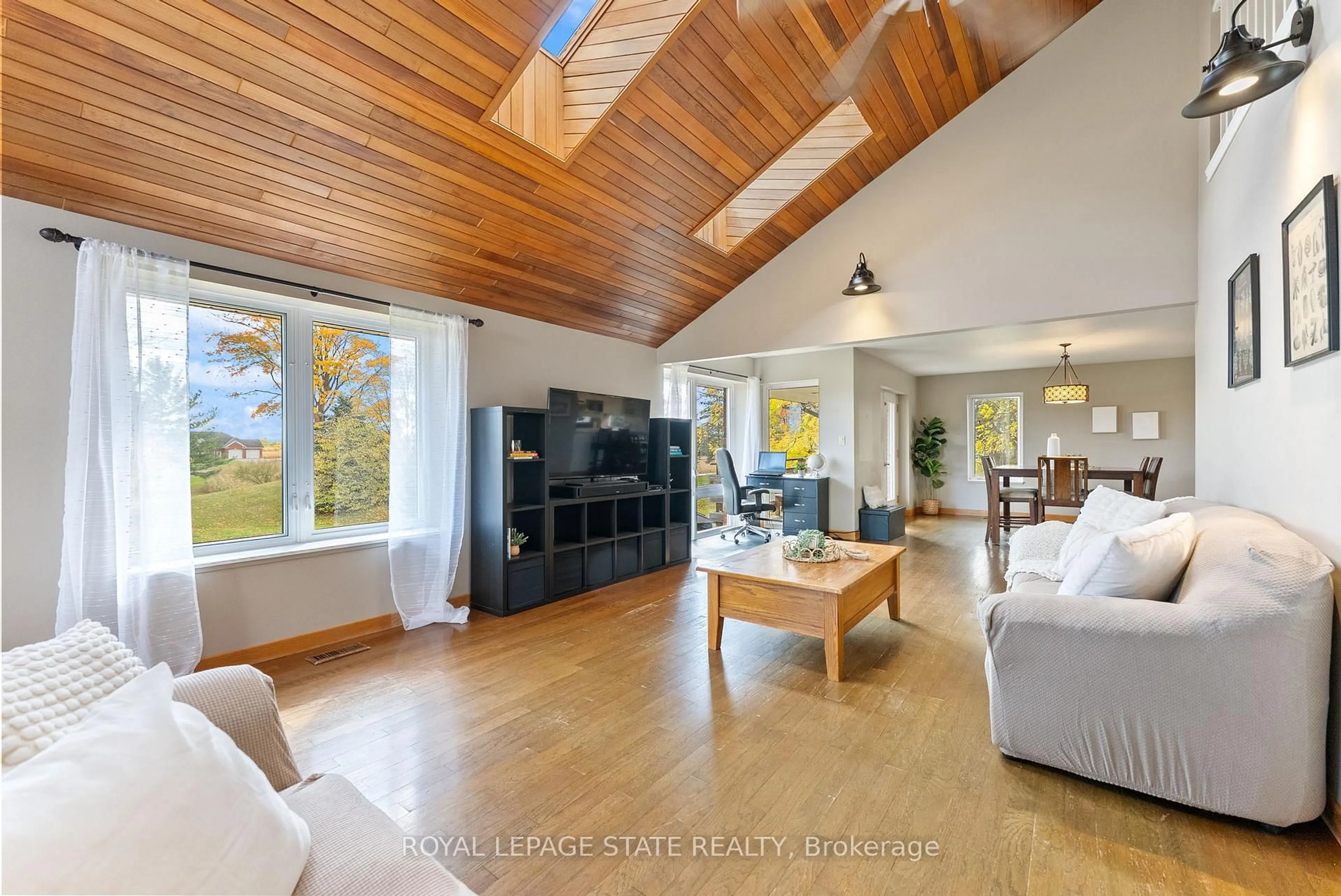 Living room with furniture, wood/laminate floor for 2329 Powerline Rd, Hamilton Ontario L0R 1T0