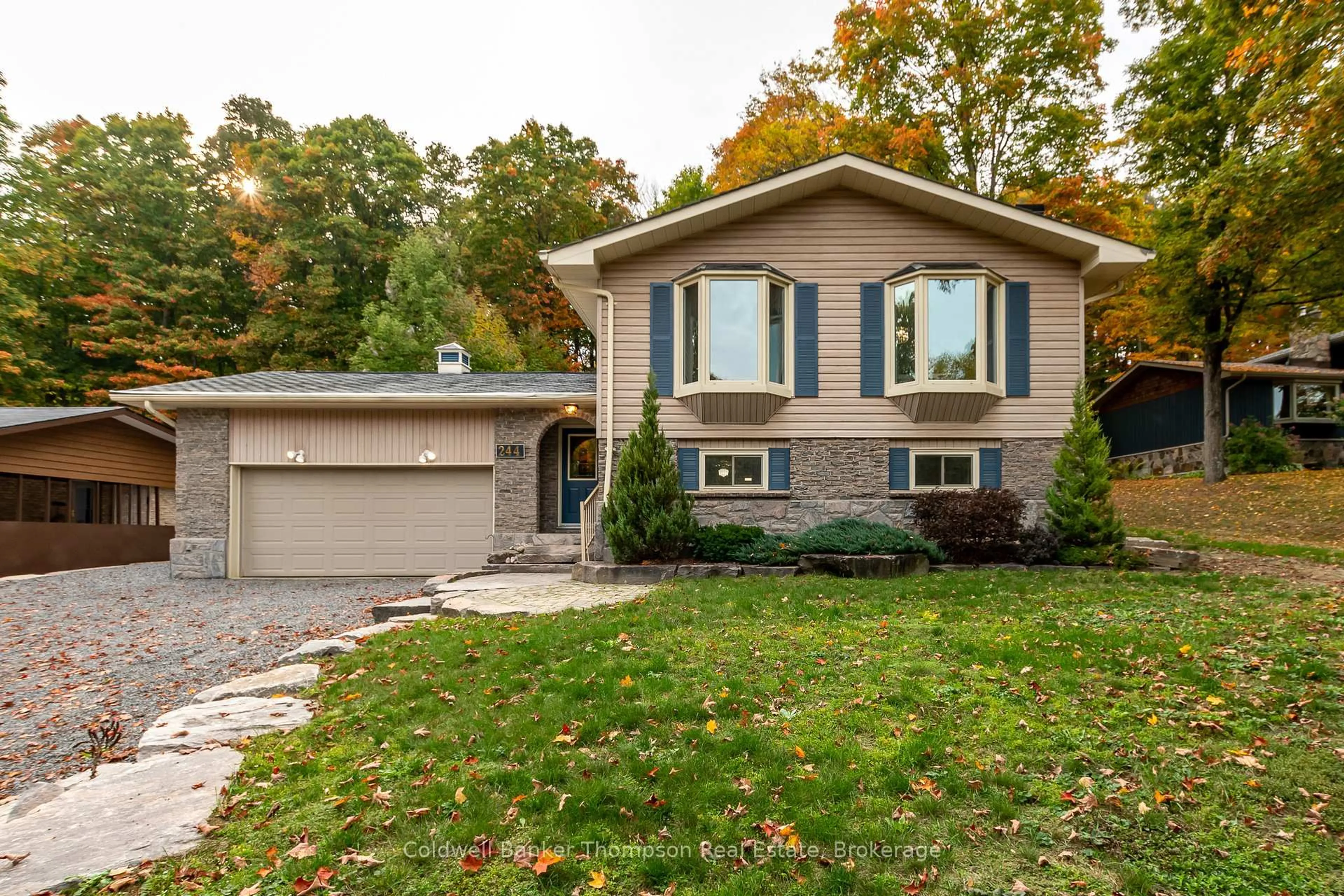 Home with brick exterior material, street for 244 Summit Dr, Huntsville Ontario P1H 1Y9