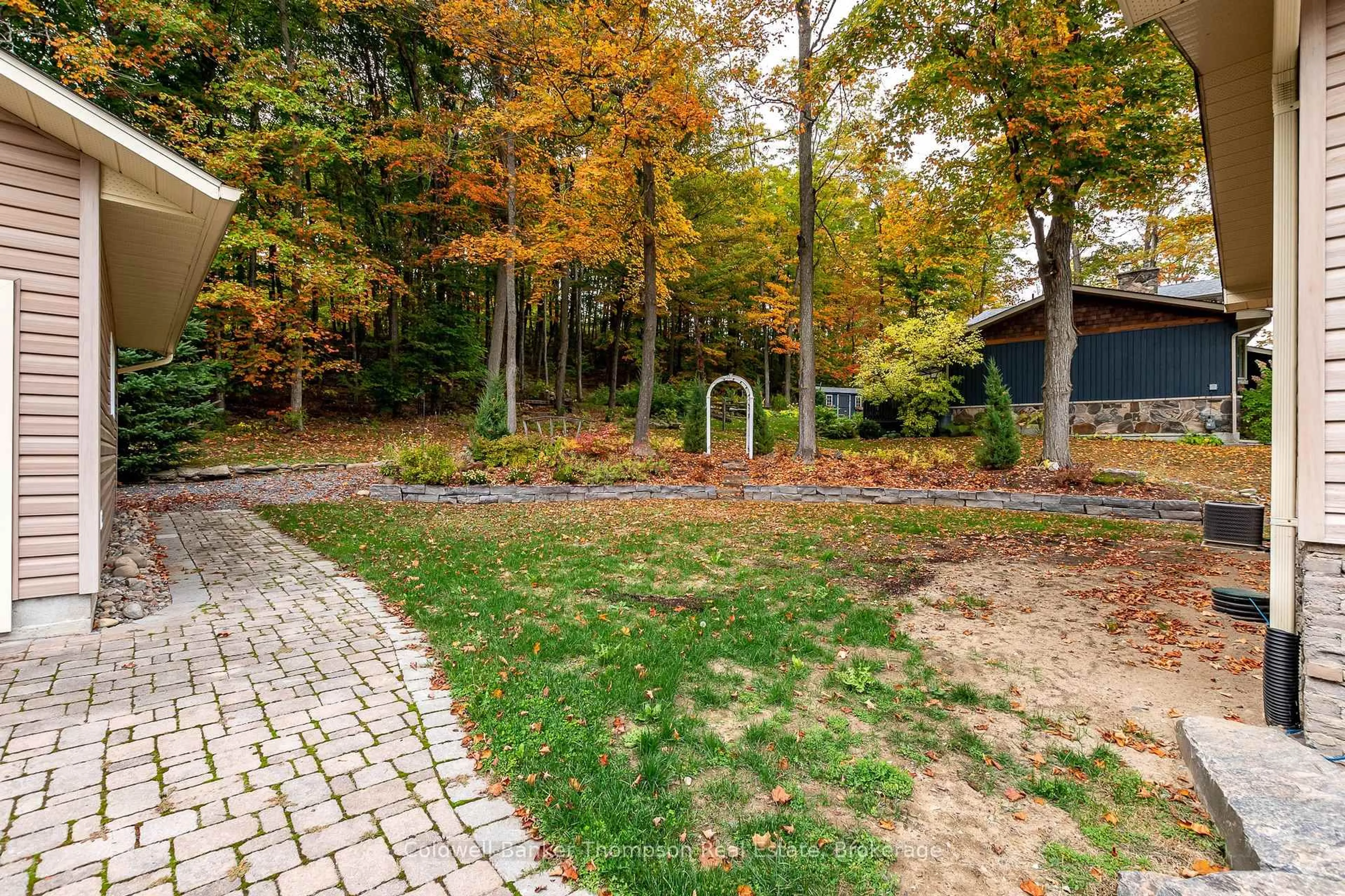 Patio, forest/trees view for 244 Summit Dr, Huntsville Ontario P1H 1Y9