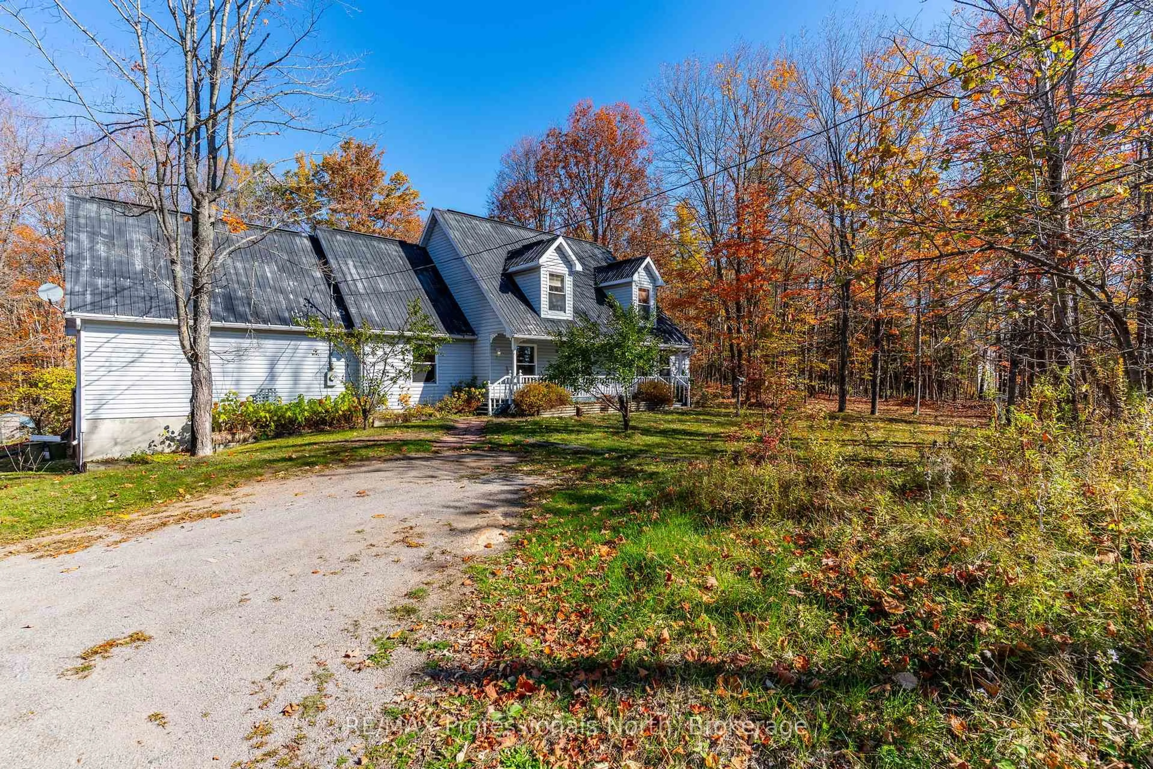 A pic from outside/outdoor area/front of a property/back of a property/a pic from drone, unknown for 1415 South Lake Rd, Minden Hills Ontario K0M 2K0