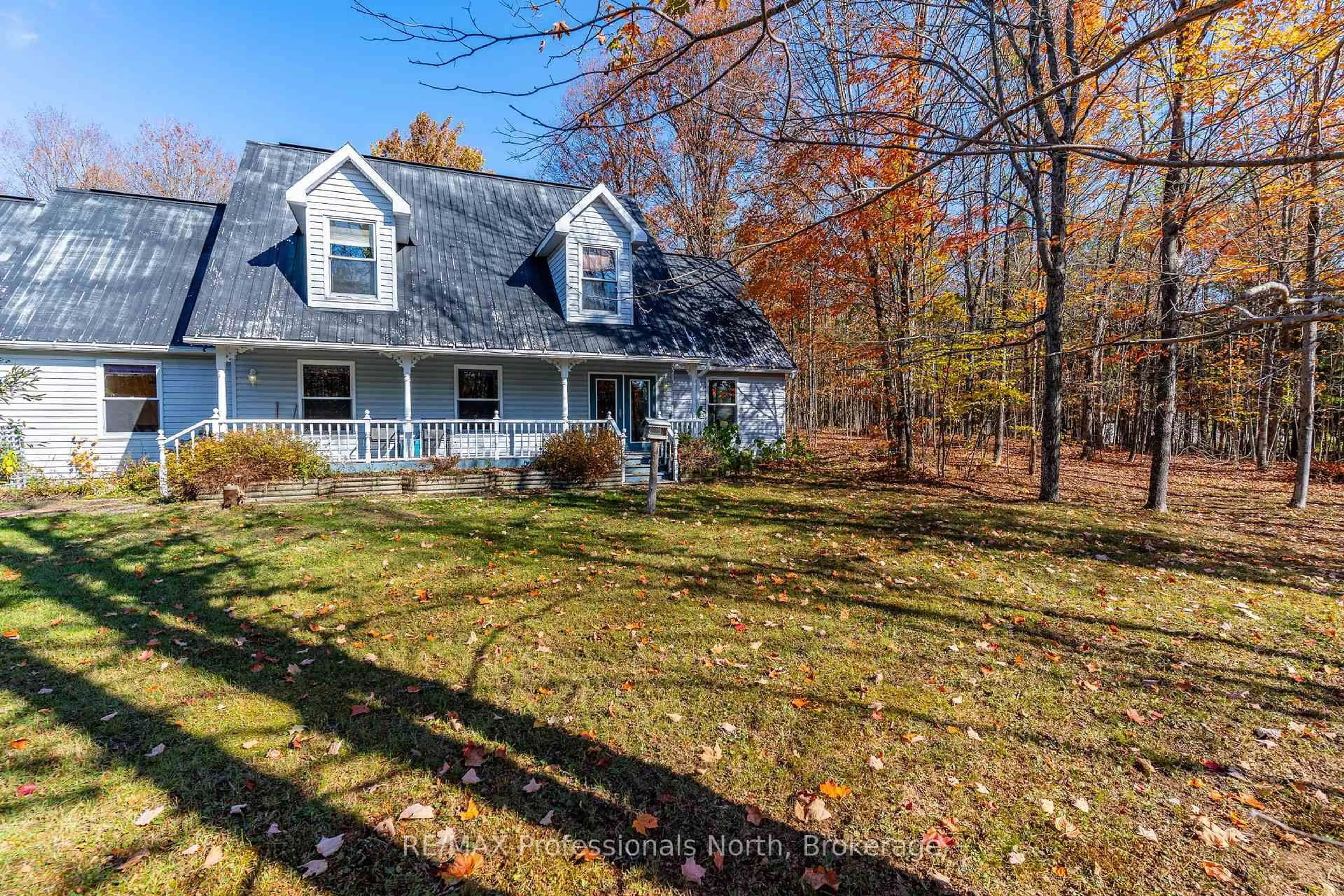 A pic from outside/outdoor area/front of a property/back of a property/a pic from drone, water/lake/river/ocean view for 1415 South Lake Rd, Minden Hills Ontario K0M 2K0