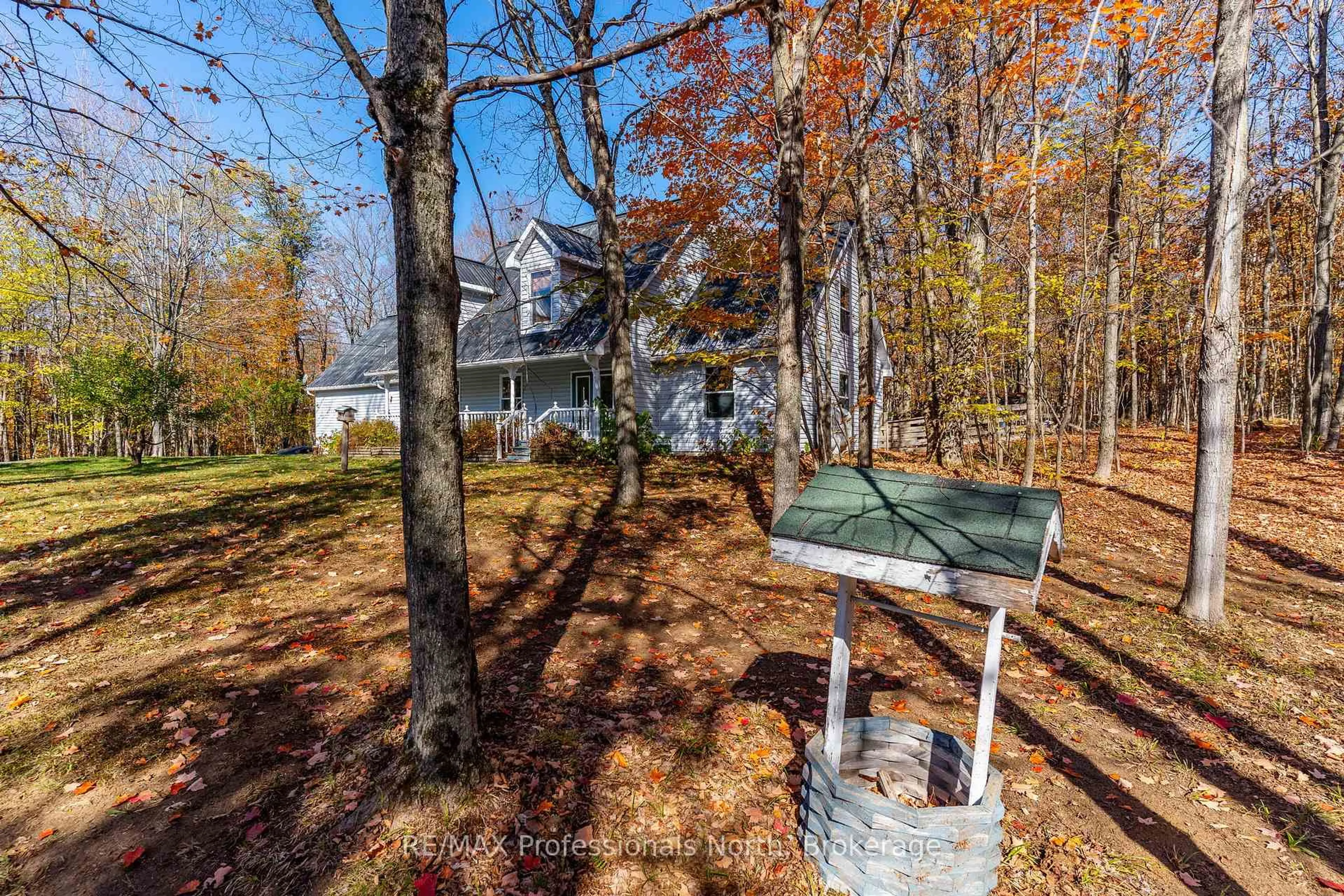 A pic from outside/outdoor area/front of a property/back of a property/a pic from drone, unknown for 1415 South Lake Rd, Minden Hills Ontario K0M 2K0