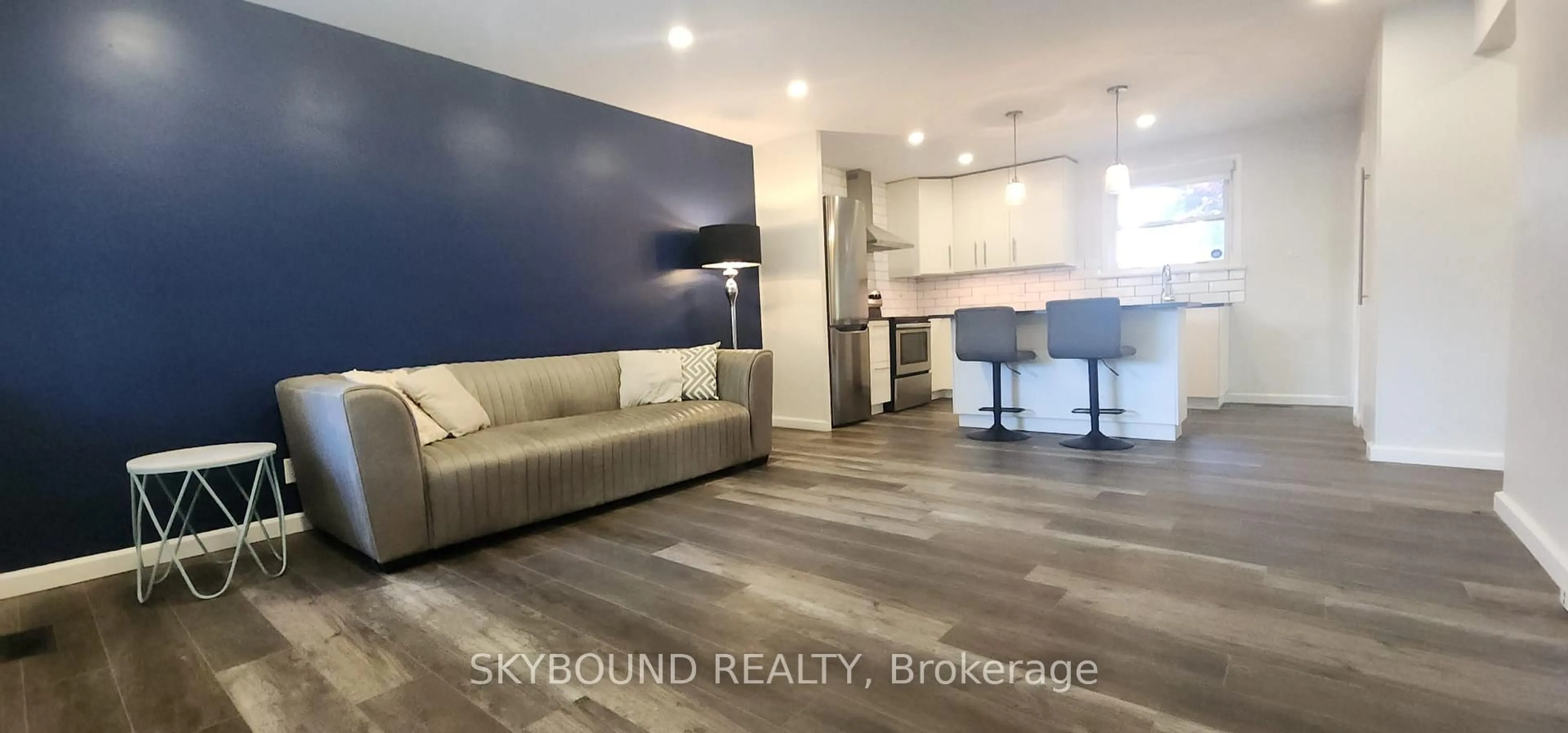 Open concept kitchen, wood/laminate floor for 189 Goddard Blvd, London East Ontario N5W 4Z9
