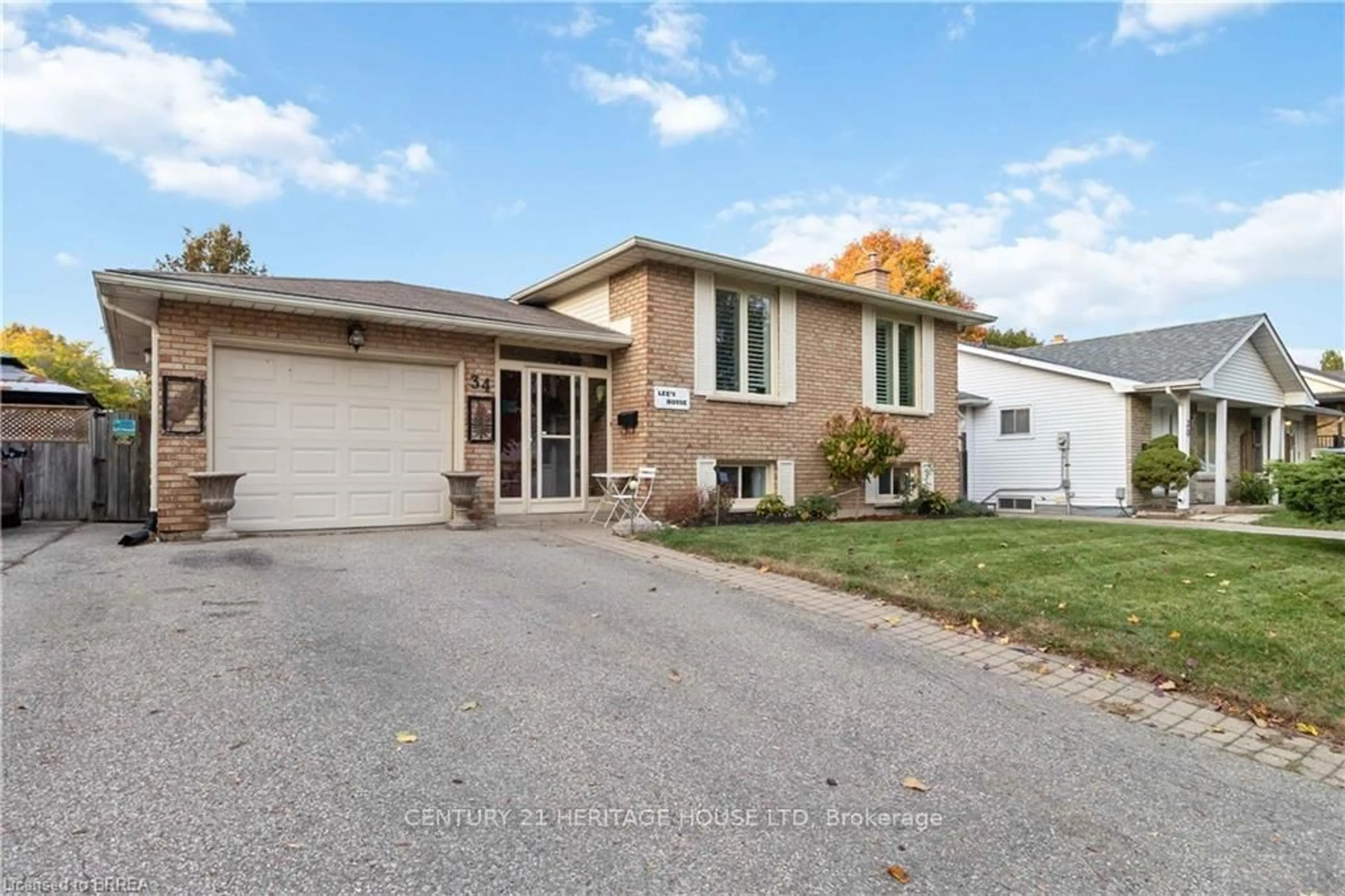 Home with brick exterior material, street for 34 SYMPATICA Acre, Brantford Ontario N3P 1G4