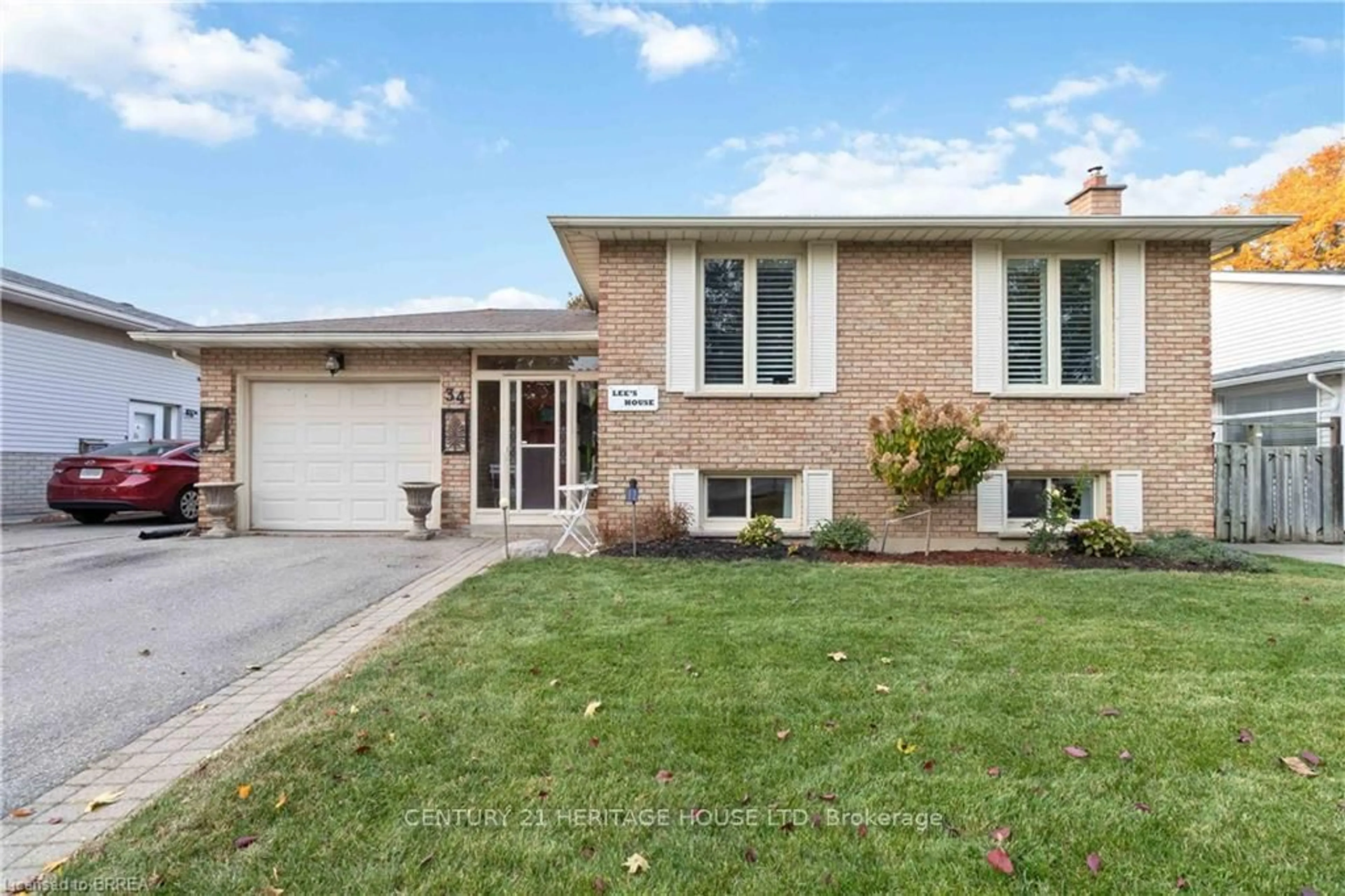 Home with brick exterior material, street for 34 SYMPATICA Acre, Brantford Ontario N3P 1G4
