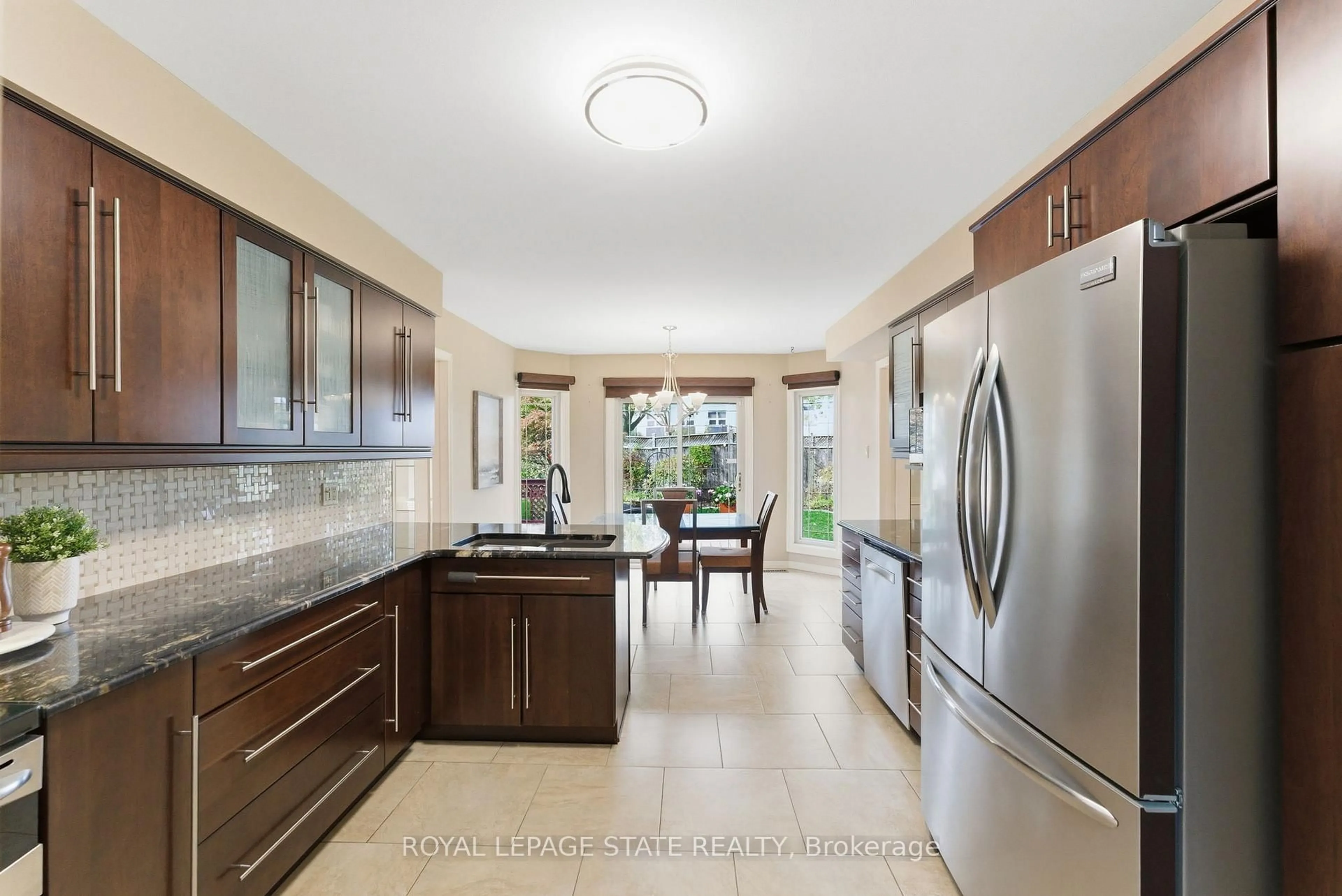 Open concept kitchen, ceramic/tile floor for 20 Vega Cres, Hamilton Ontario L8E 4S7