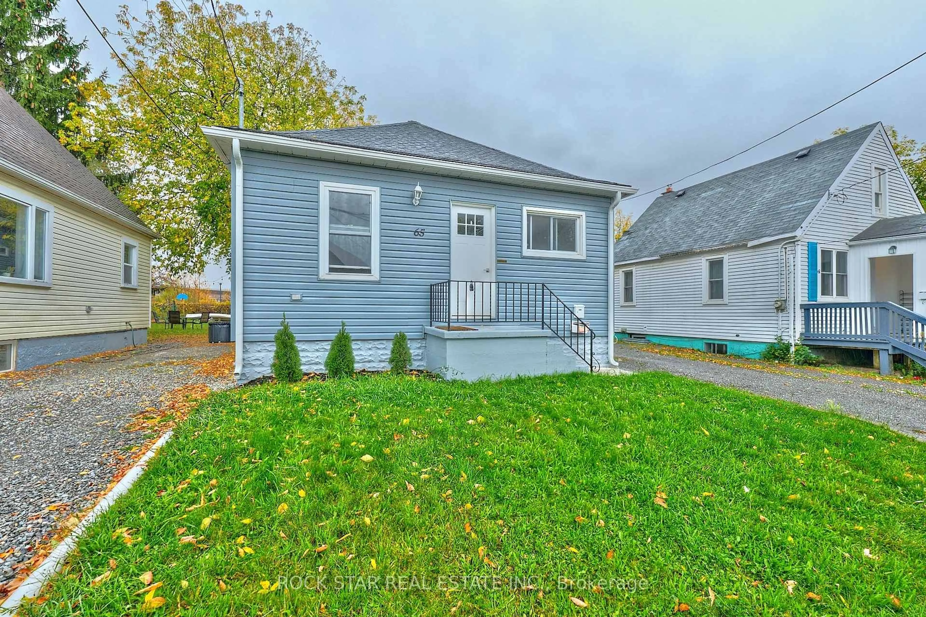 Home with vinyl exterior material, street for 65 Almond St, Welland Ontario L3B 3P6