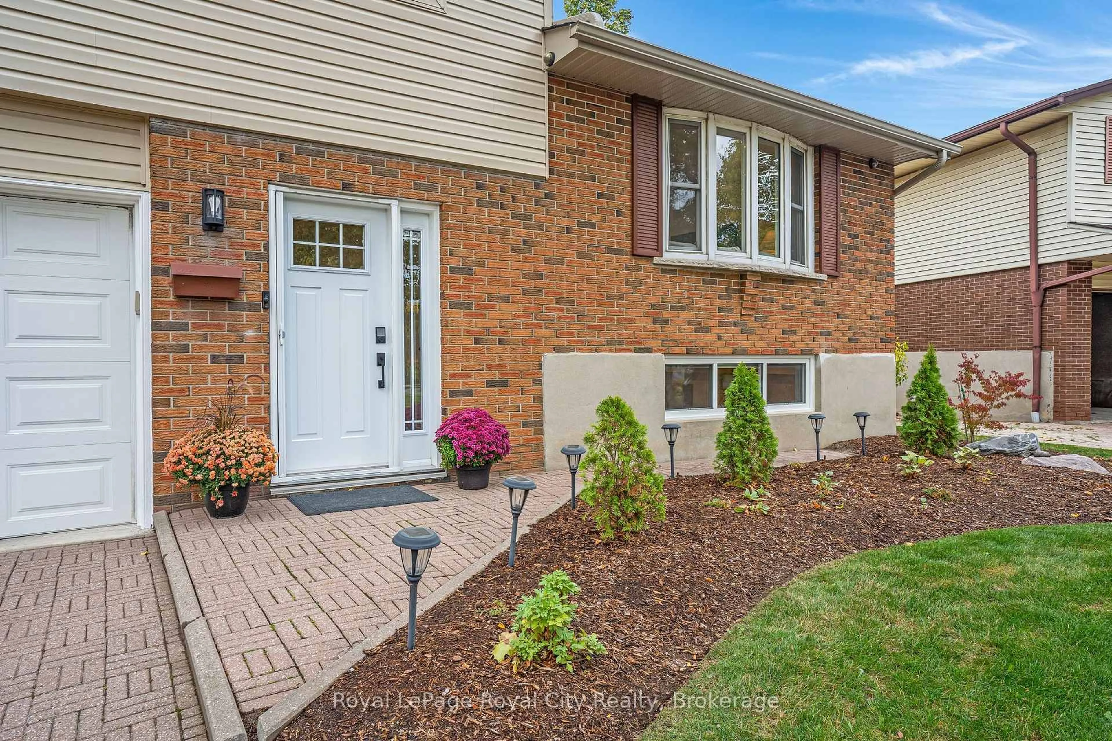 Home with brick exterior material, street for 31 Lambert Cres, Guelph Ontario N1G 2R4