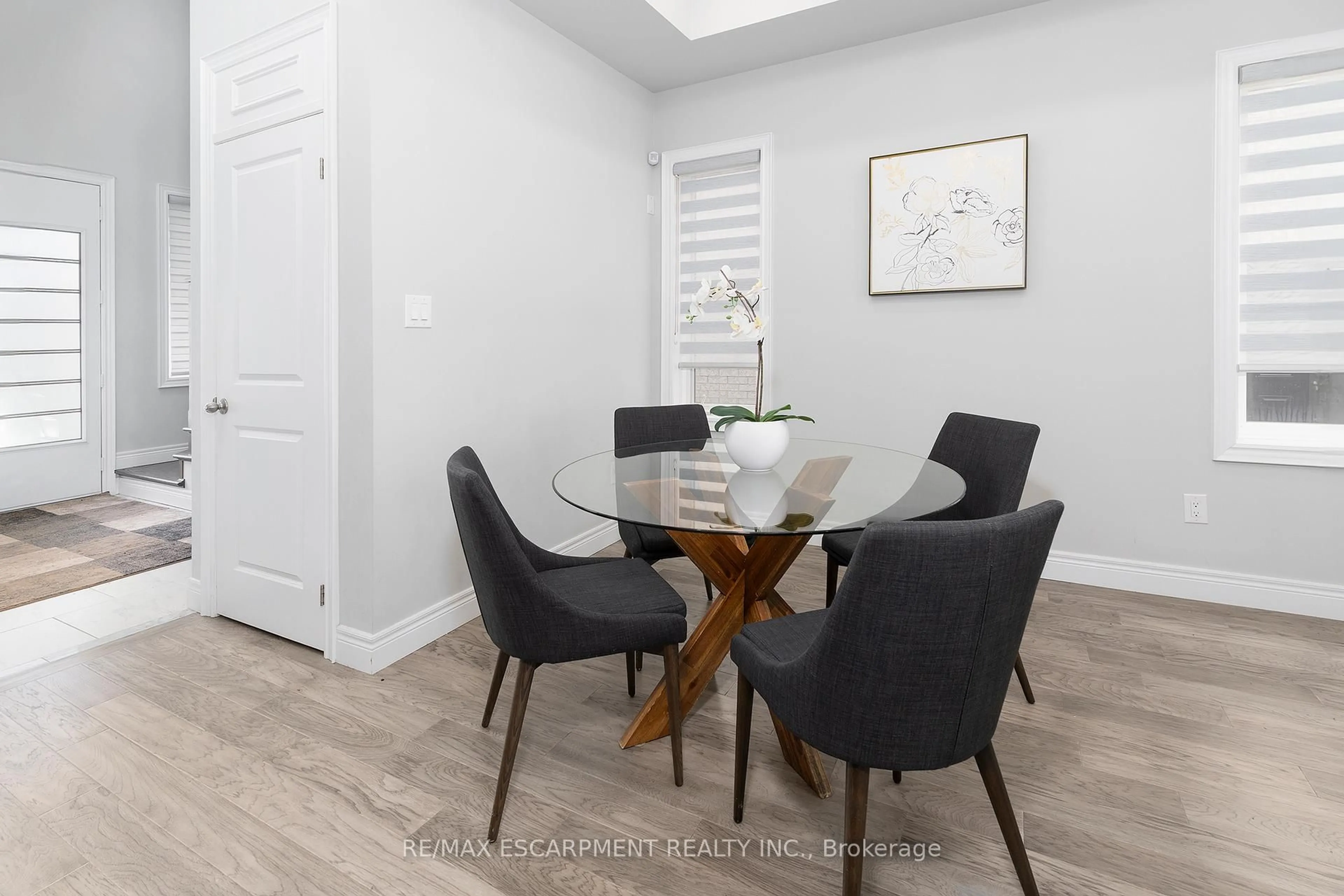 Dining room, wood/laminate floor for 44 Miller Dr, Hamilton Ontario L9G 2J1
