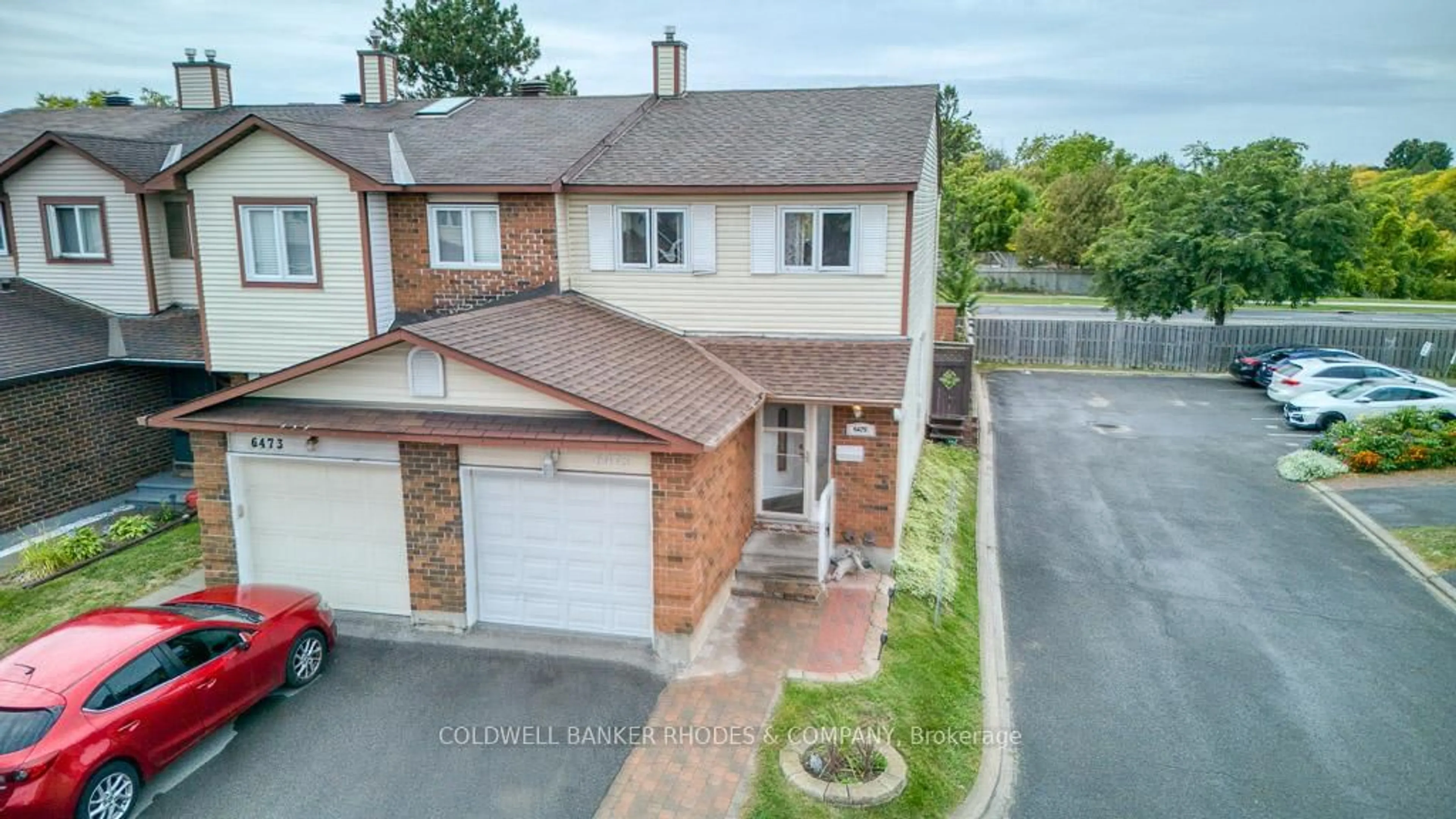 A pic from outside/outdoor area/front of a property/back of a property/a pic from drone, street for 6475 Colony Sq #18, Orleans Ontario K1C 3E1