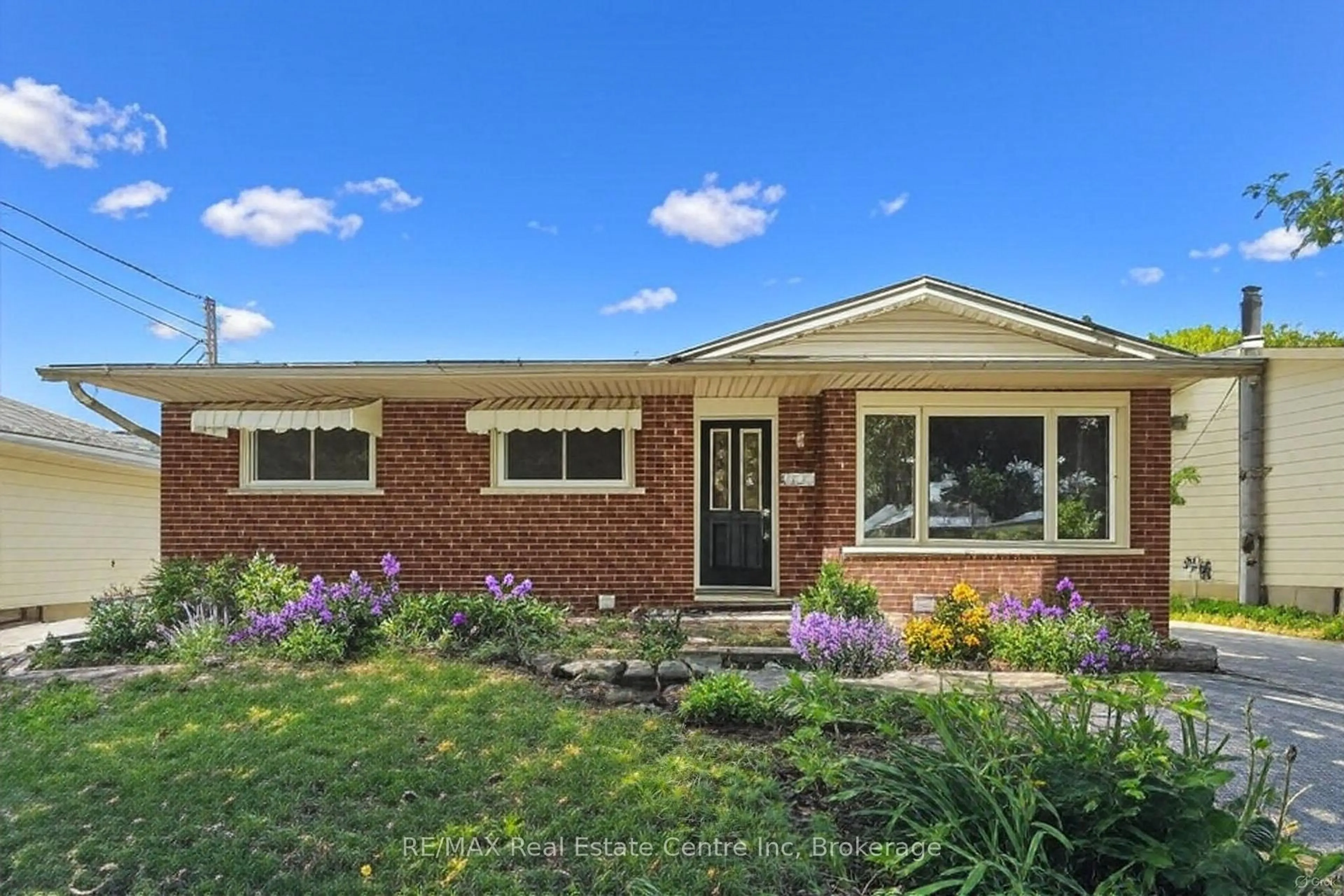 Home with brick exterior material, street for 72 Ferndale Ave, Guelph Ontario N1E 1B5