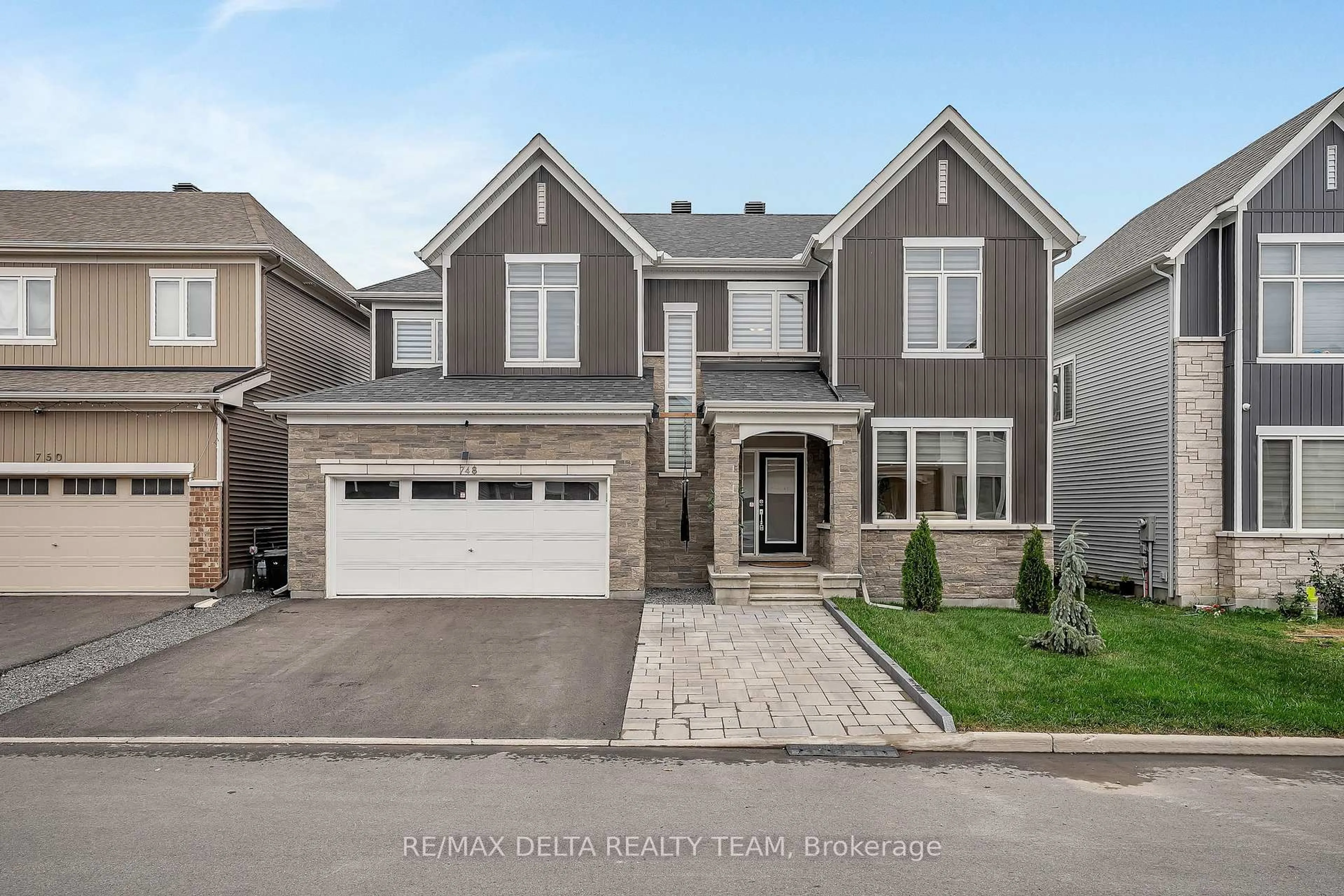 Home with brick exterior material, street for 748 Vennecy Terr, Ottawa Ontario K1W 1H2