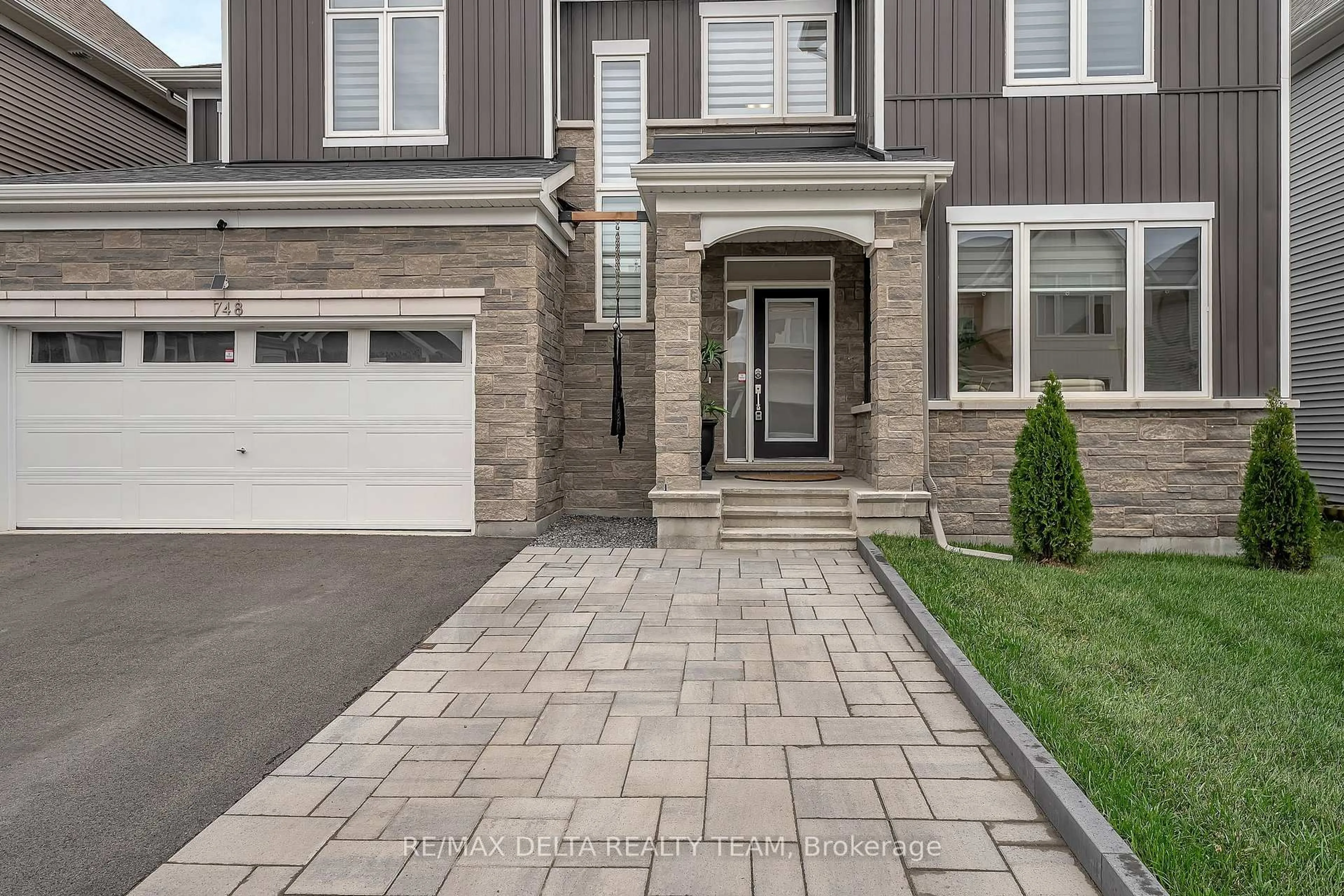 Home with brick exterior material, street for 748 Vennecy Terr, Ottawa Ontario K1W 1H2