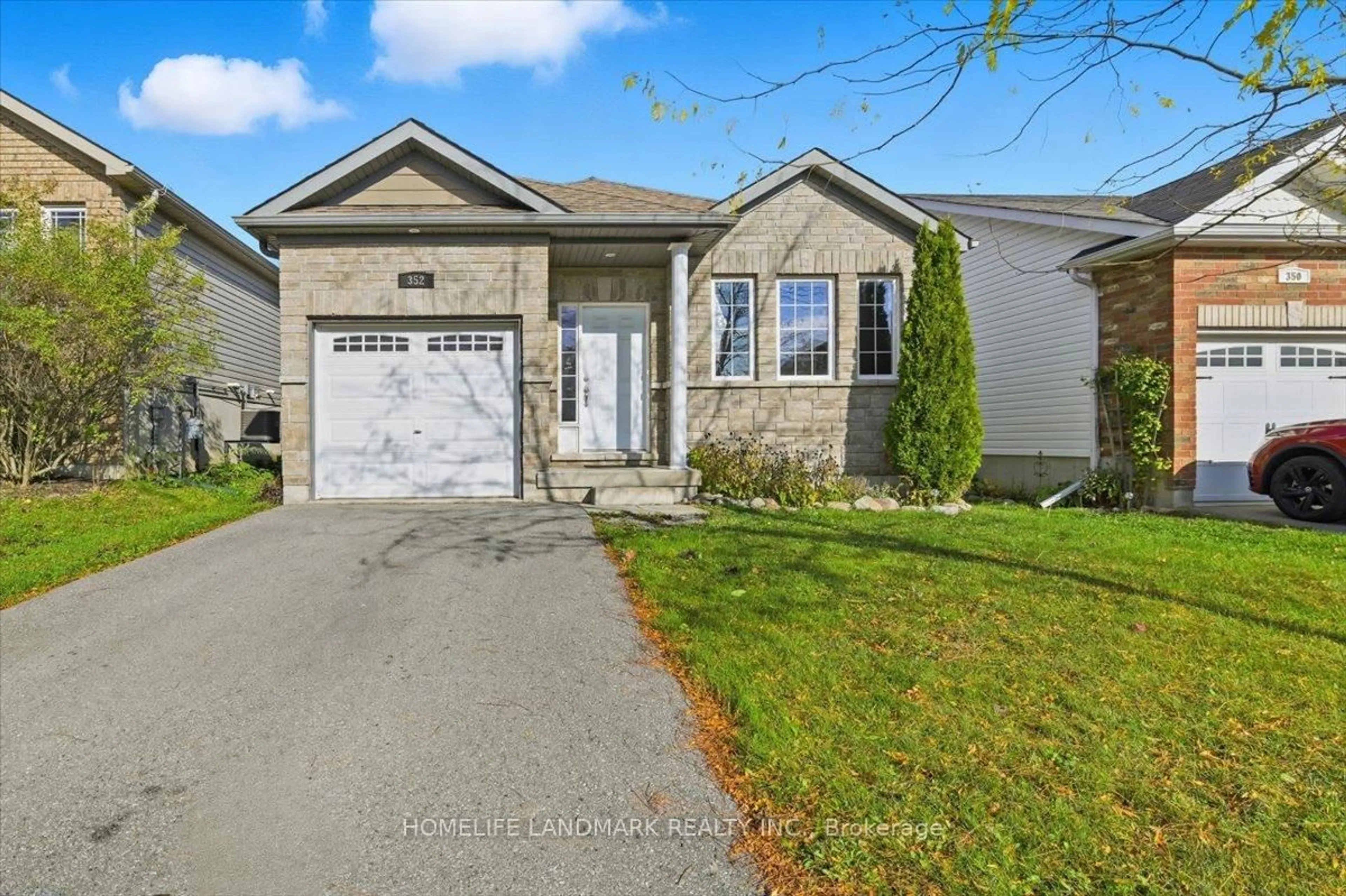 Home with vinyl exterior material, street for 352 Blacksmith Way, Peterborough Ontario K9L 0B4