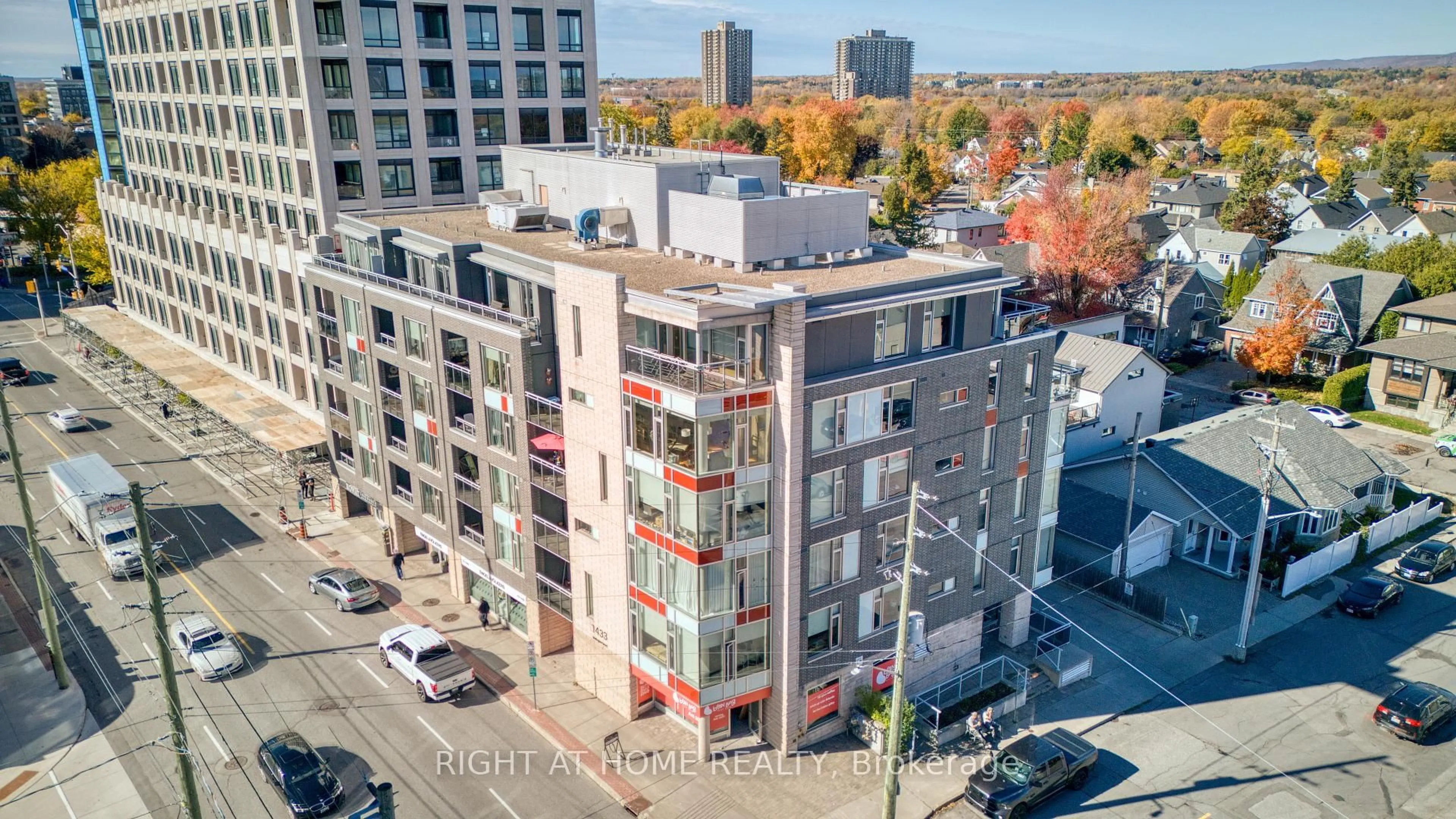 A pic from outside/outdoor area/front of a property/back of a property/a pic from drone, city buildings view from balcony for 1433 Wellington St #Unit #206, Ottawa Ontario K1Y 2X4