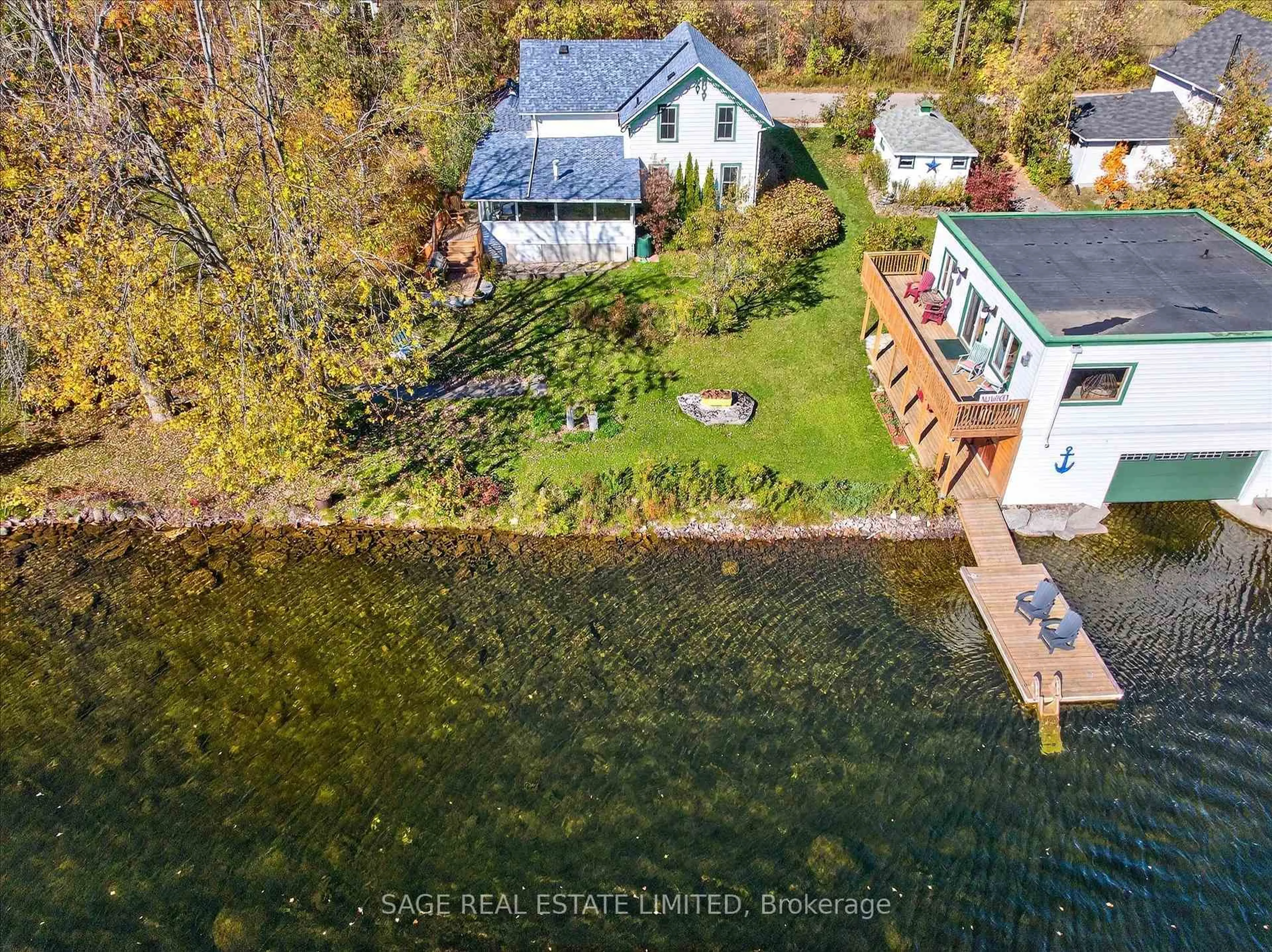 A pic from outside/outdoor area/front of a property/back of a property/a pic from drone, water/lake/river/ocean view for 33 North Water St, Kawartha Lakes Ontario K0M 1K0