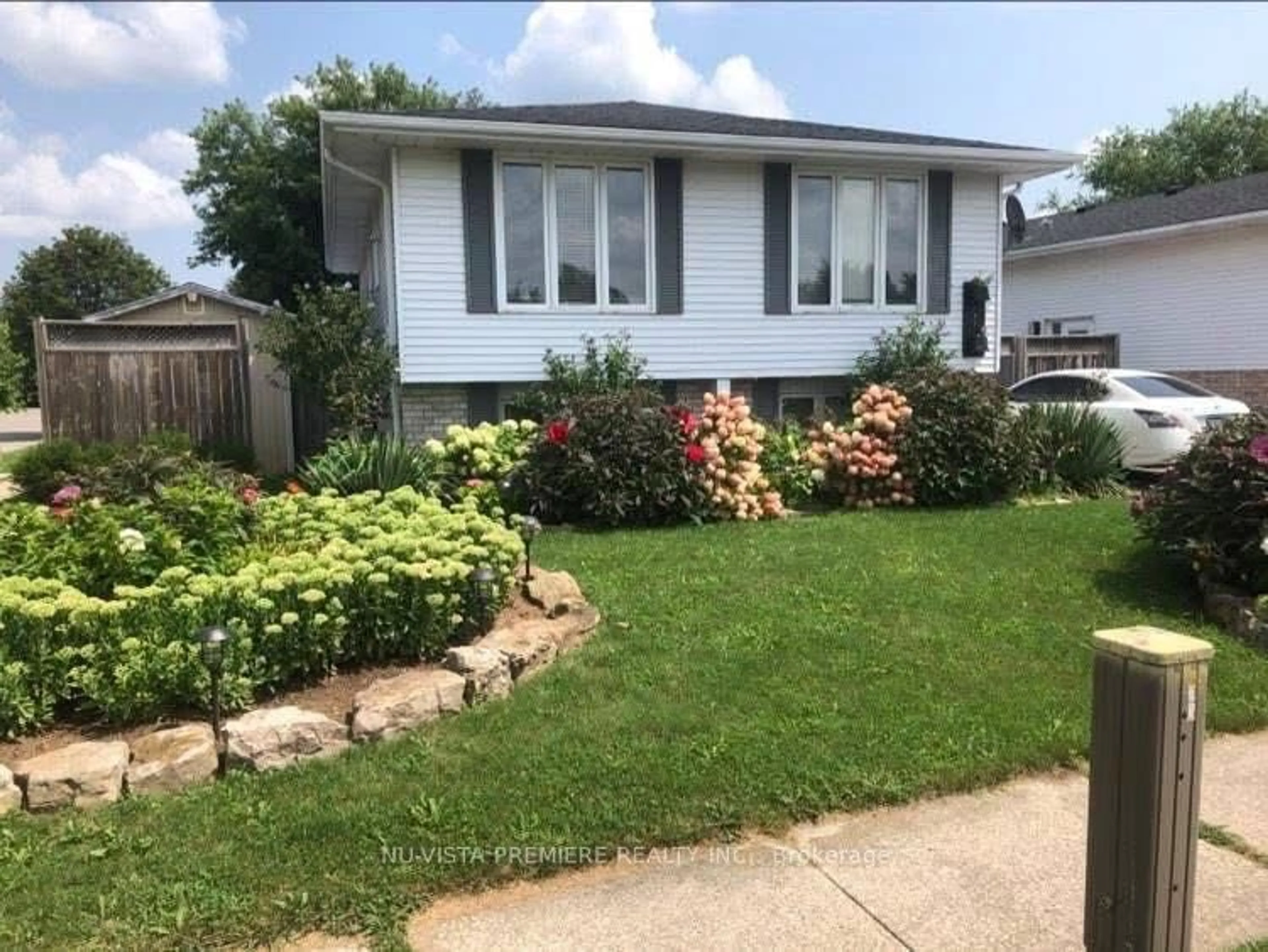 Home with vinyl exterior material, street for 1 Osijek Cres, Brantford Ontario N3P 1Z3