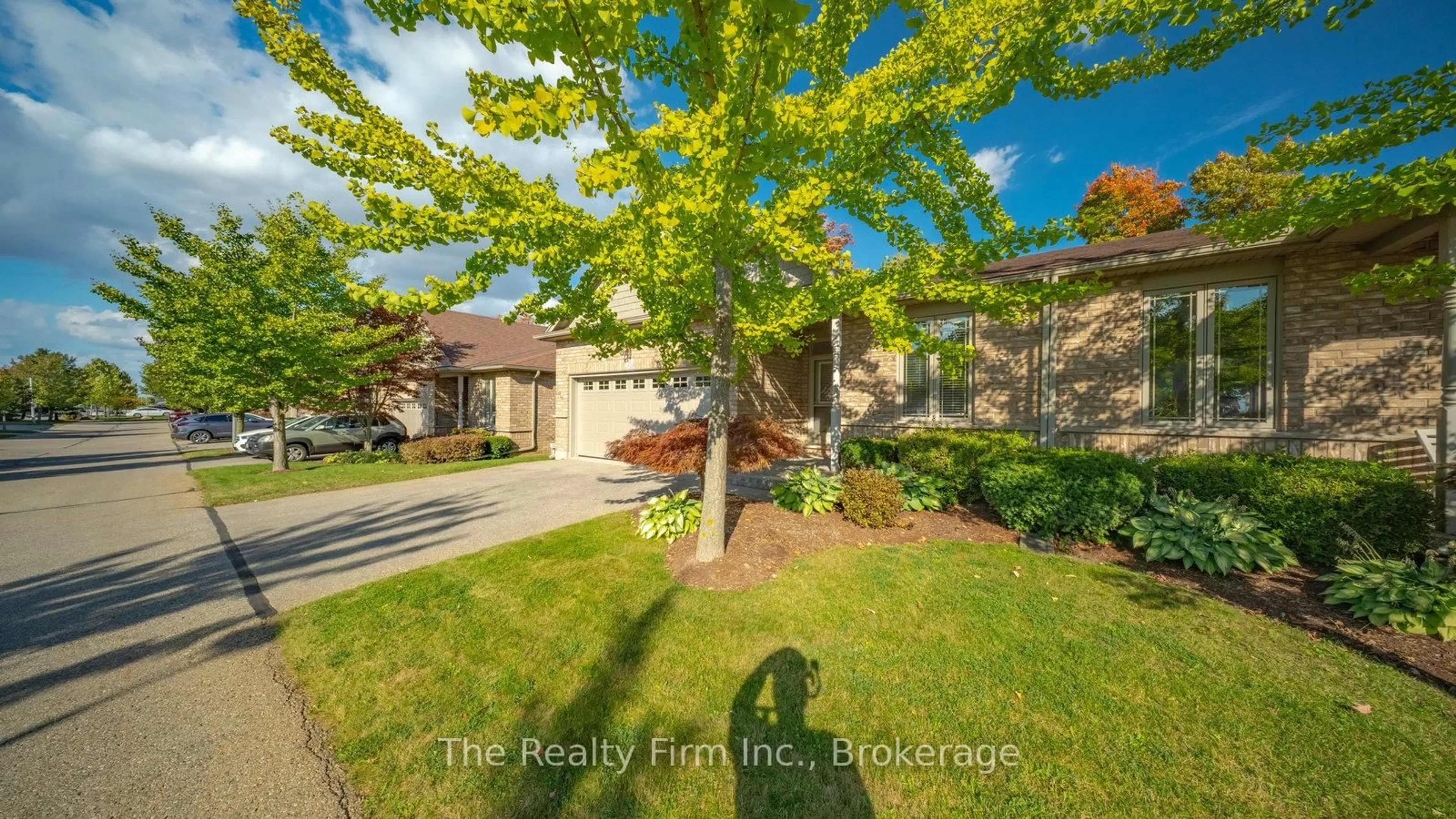 A pic from outside/outdoor area/front of a property/back of a property/a pic from drone, street for 540 Spitfire St #20, Woodstock Ontario N4T 0C2