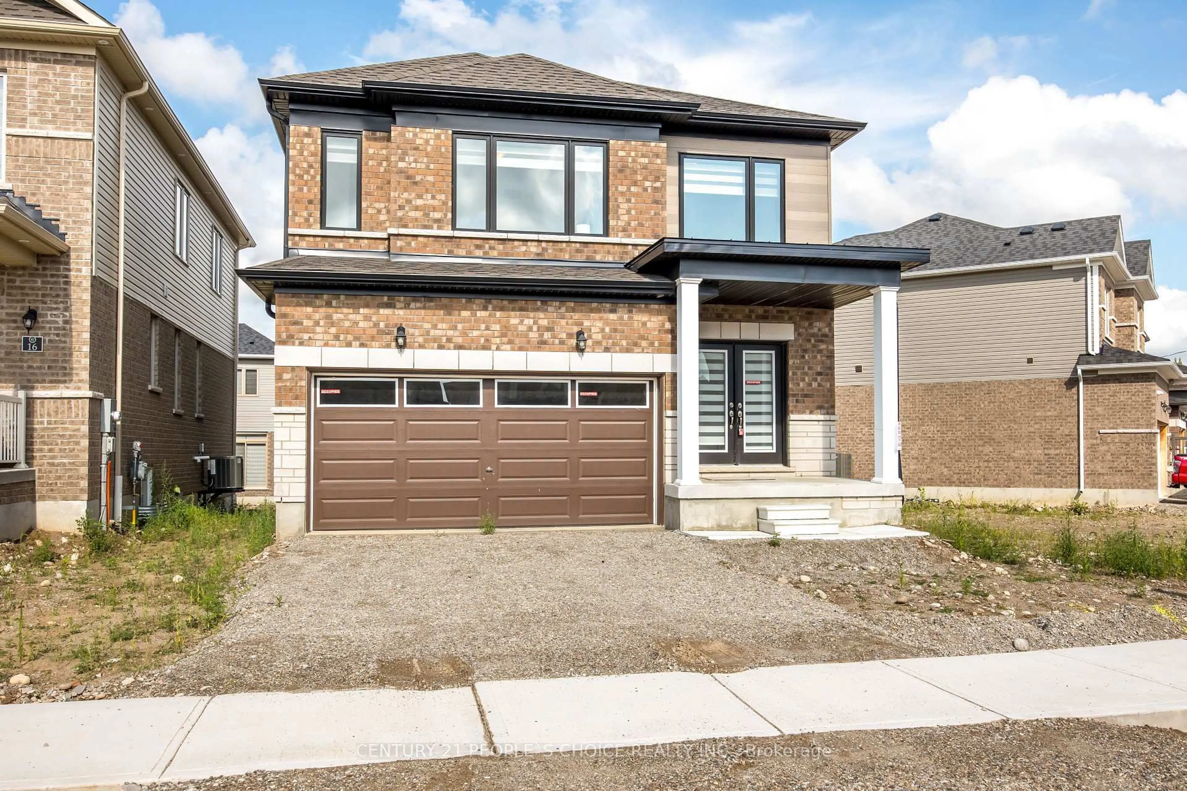 Home with brick exterior material, street for 18 Heming St, Brant Ontario N3L 0M5