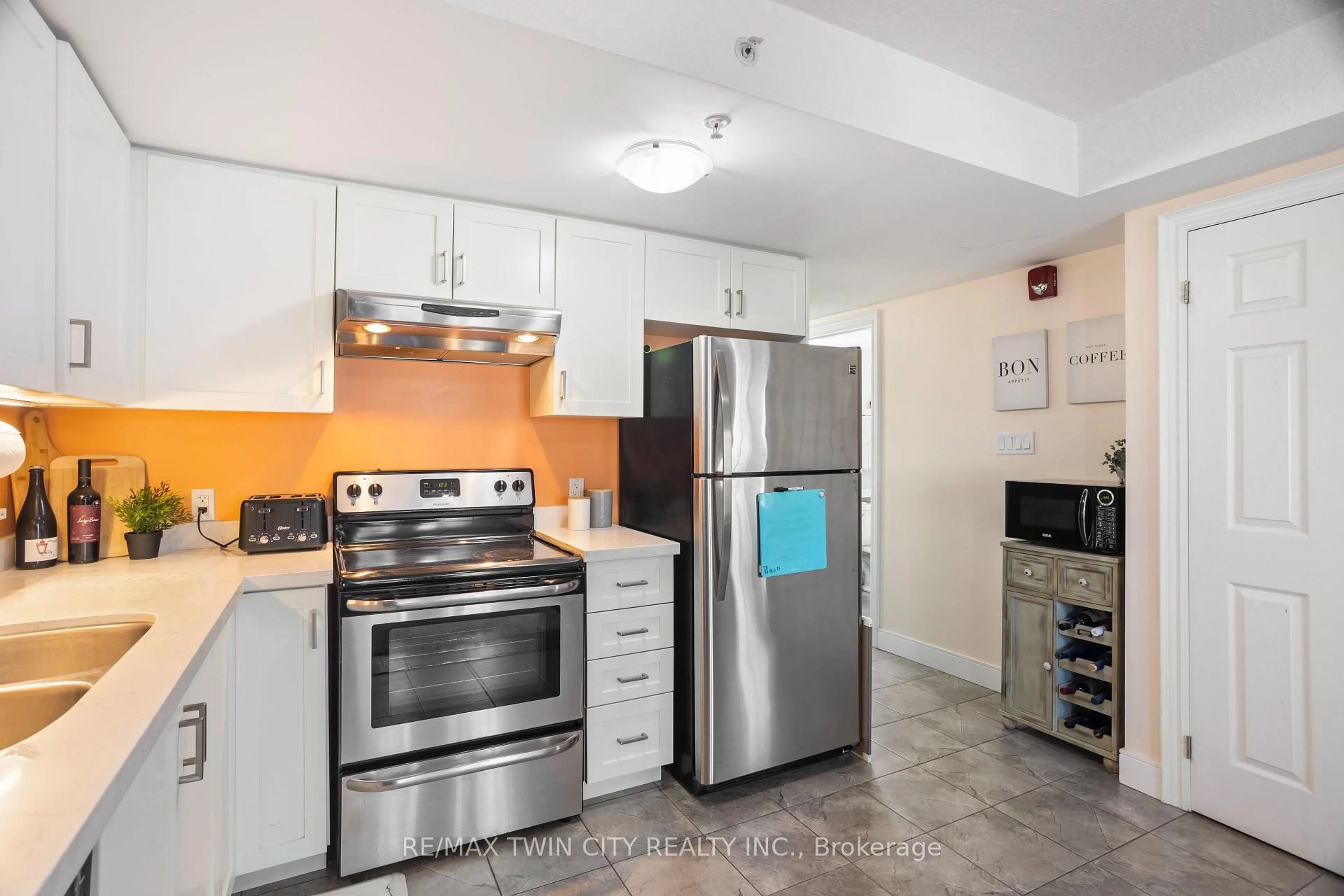 Standard kitchen, ceramic/tile floor for 64 Frederick Dr #204, Guelph Ontario N1L 0P3