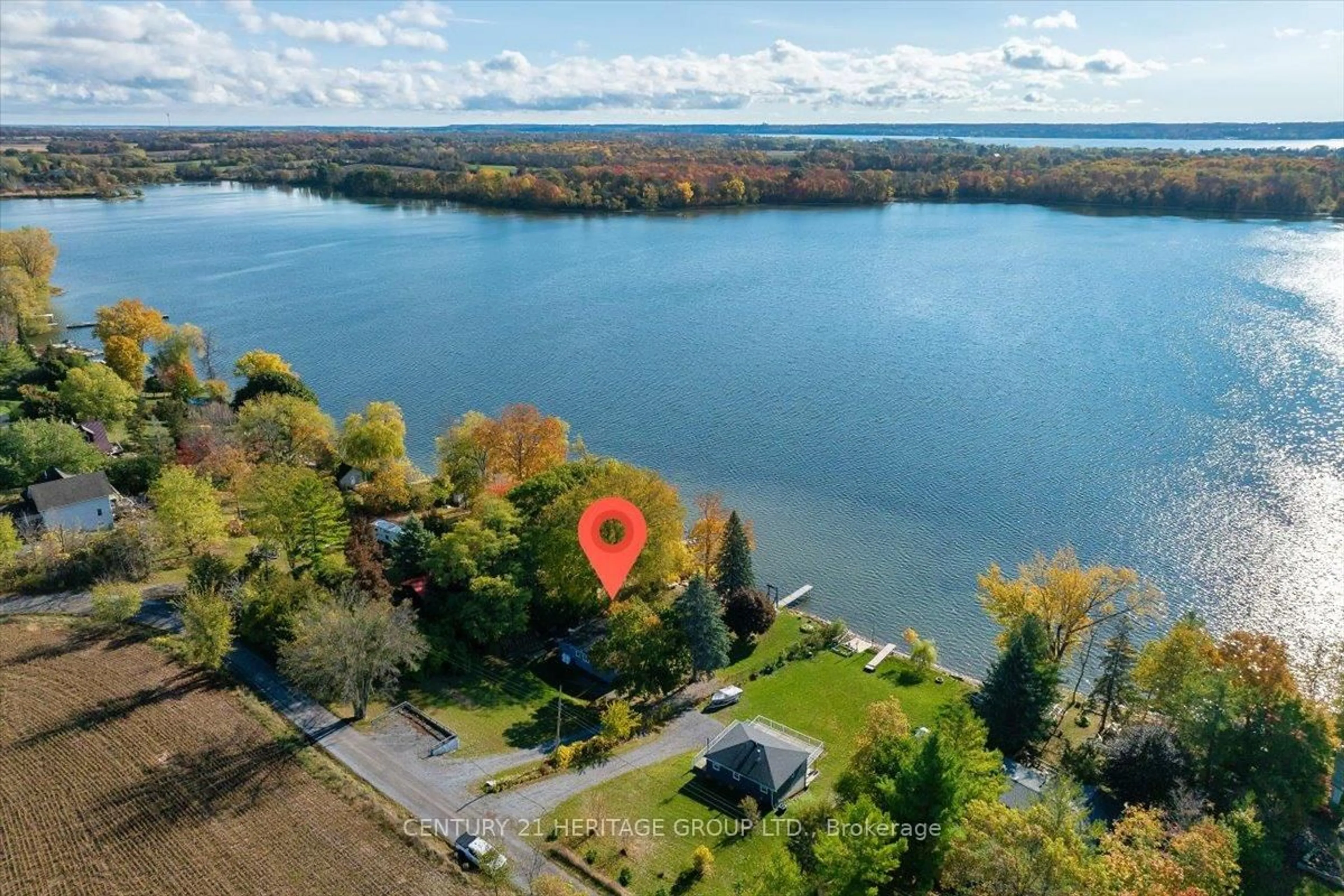 A pic from outside/outdoor area/front of a property/back of a property/a pic from drone, water/lake/river/ocean view for 14 Bass Cove Rd, Napanee Ontario K7R 3K7