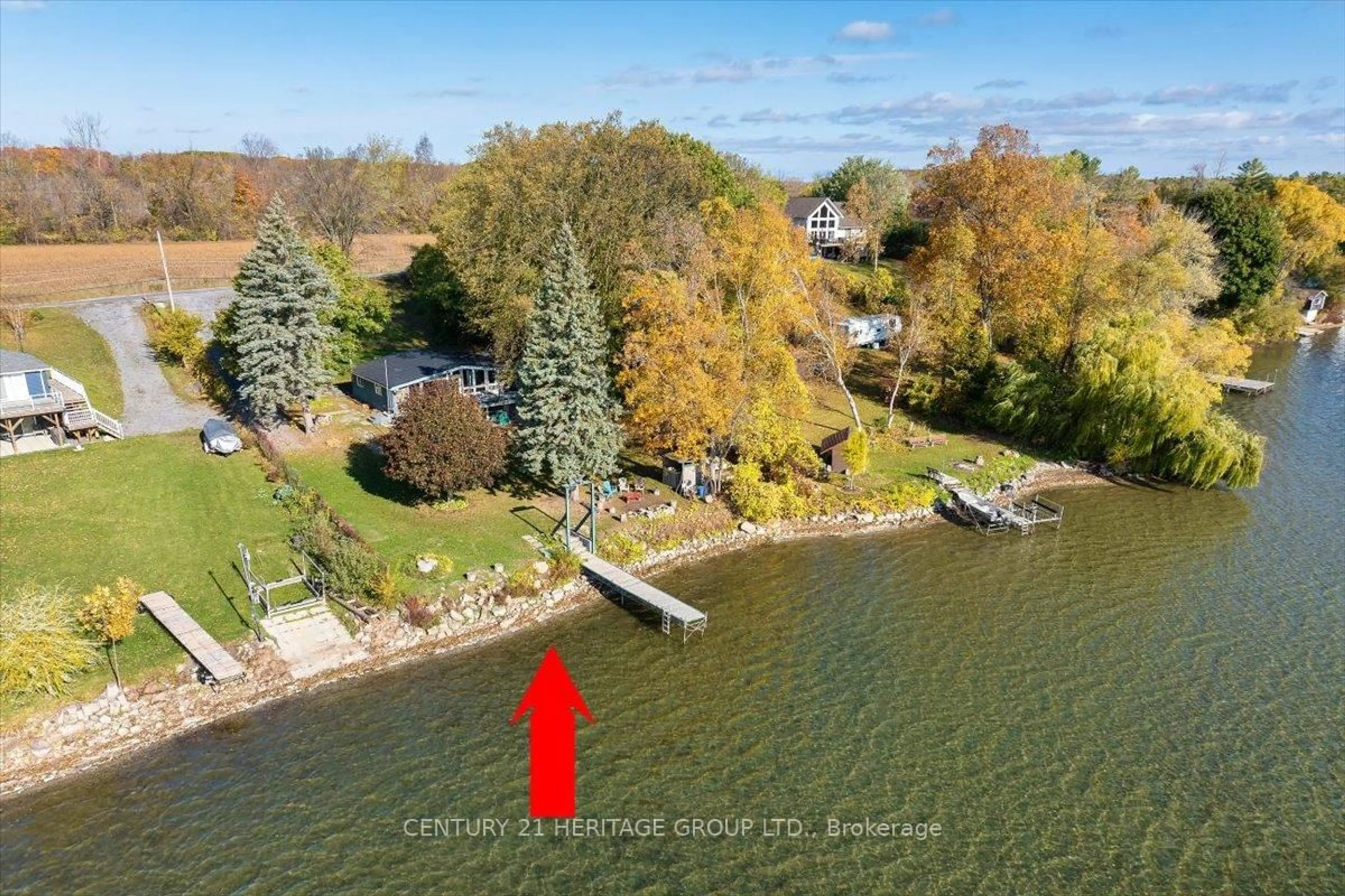 A pic from outside/outdoor area/front of a property/back of a property/a pic from drone, water/lake/river/ocean view for 14 Bass Cove Rd, Napanee Ontario K7R 3K7