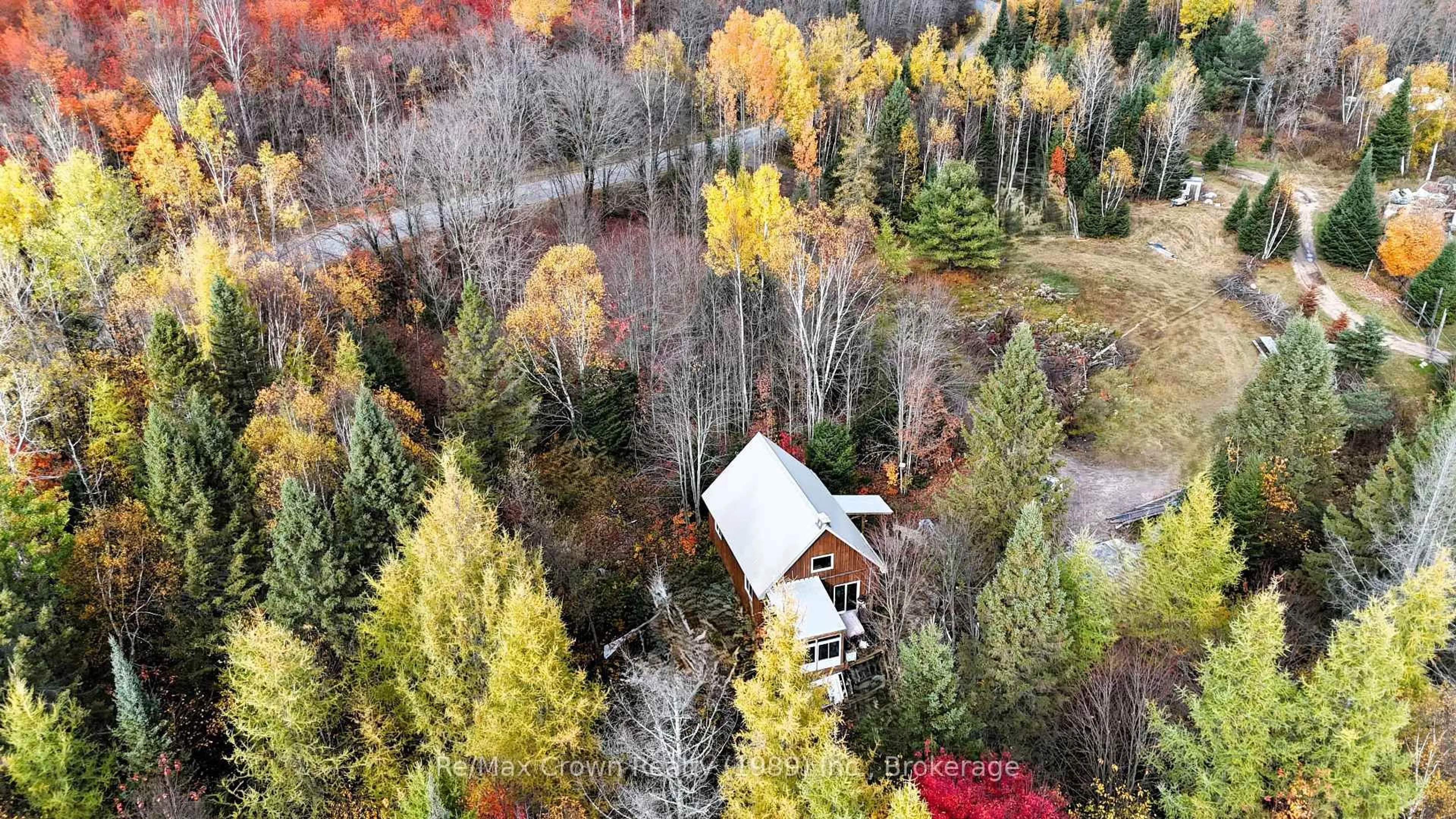 A pic from outside/outdoor area/front of a property/back of a property/a pic from drone, forest/trees view for 575 Muskoka Rd, Strong Ontario P0A 1Z0
