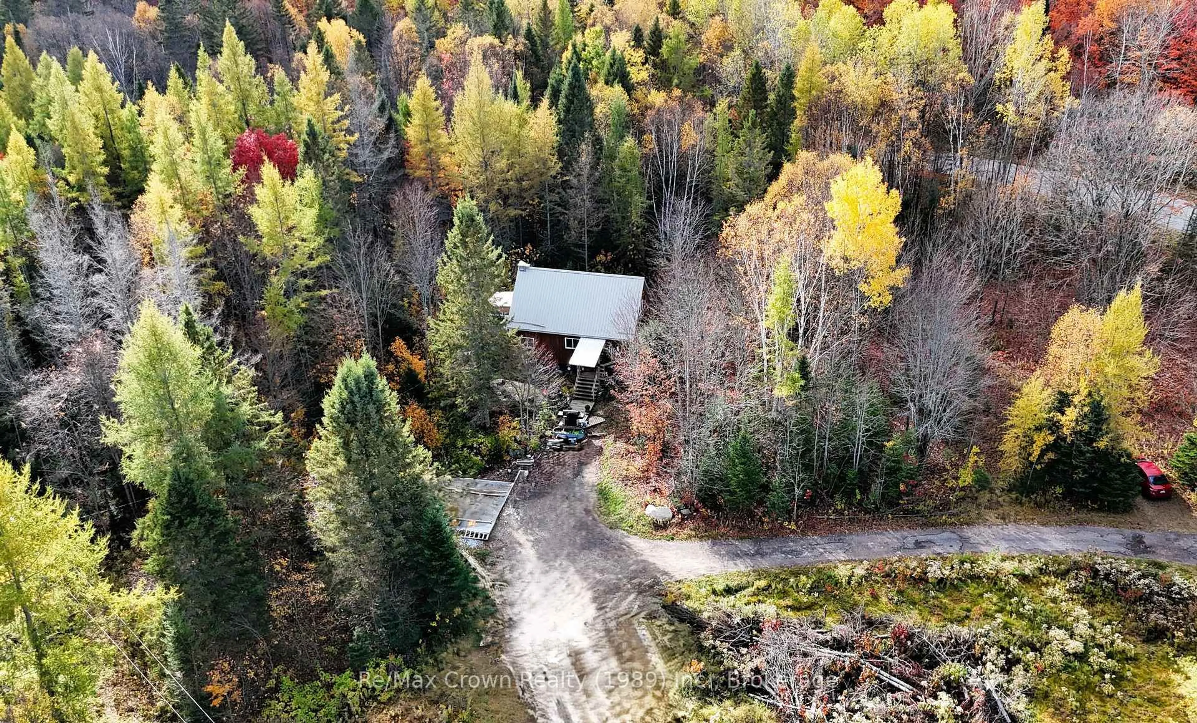 A pic from outside/outdoor area/front of a property/back of a property/a pic from drone, forest/trees view for 575 Muskoka Rd, Strong Ontario P0A 1Z0