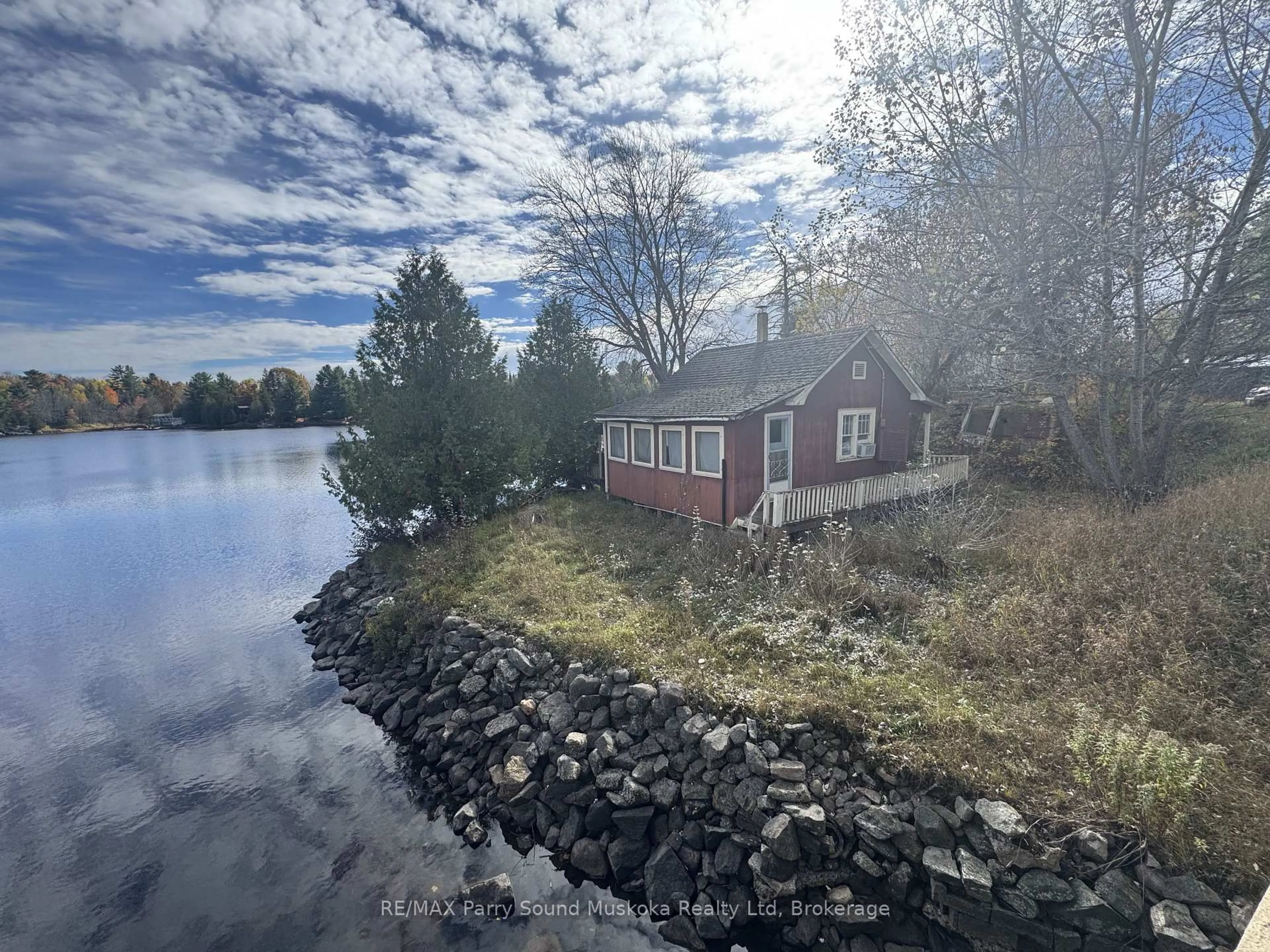 A pic from outside/outdoor area/front of a property/back of a property/a pic from drone, water/lake/river/ocean view for 2217 124 Highway, Whitestone Ontario P0A 1G0