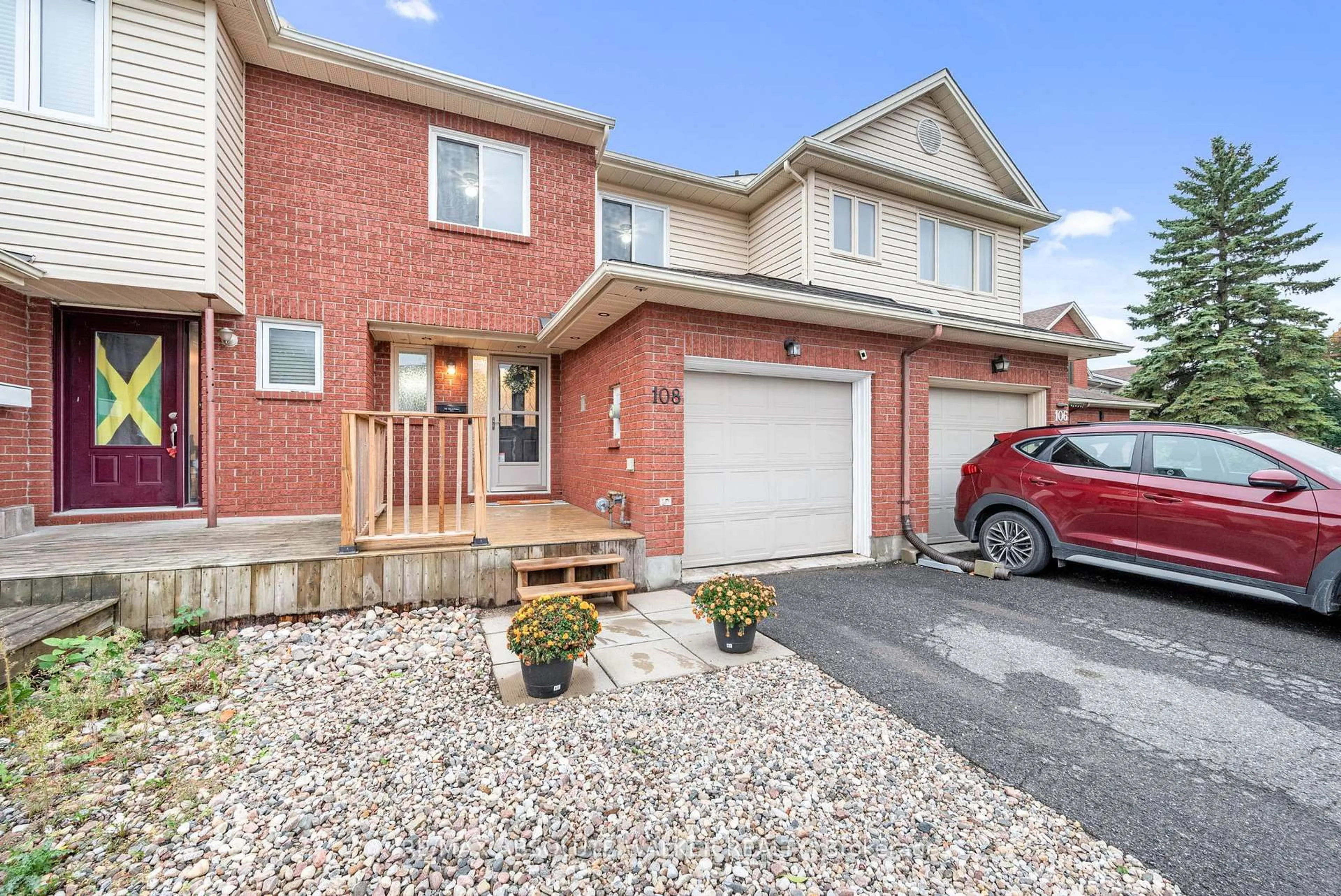 Home with brick exterior material, street for 108 Cedarock Dr, Ottawa Ontario K2M 2H5