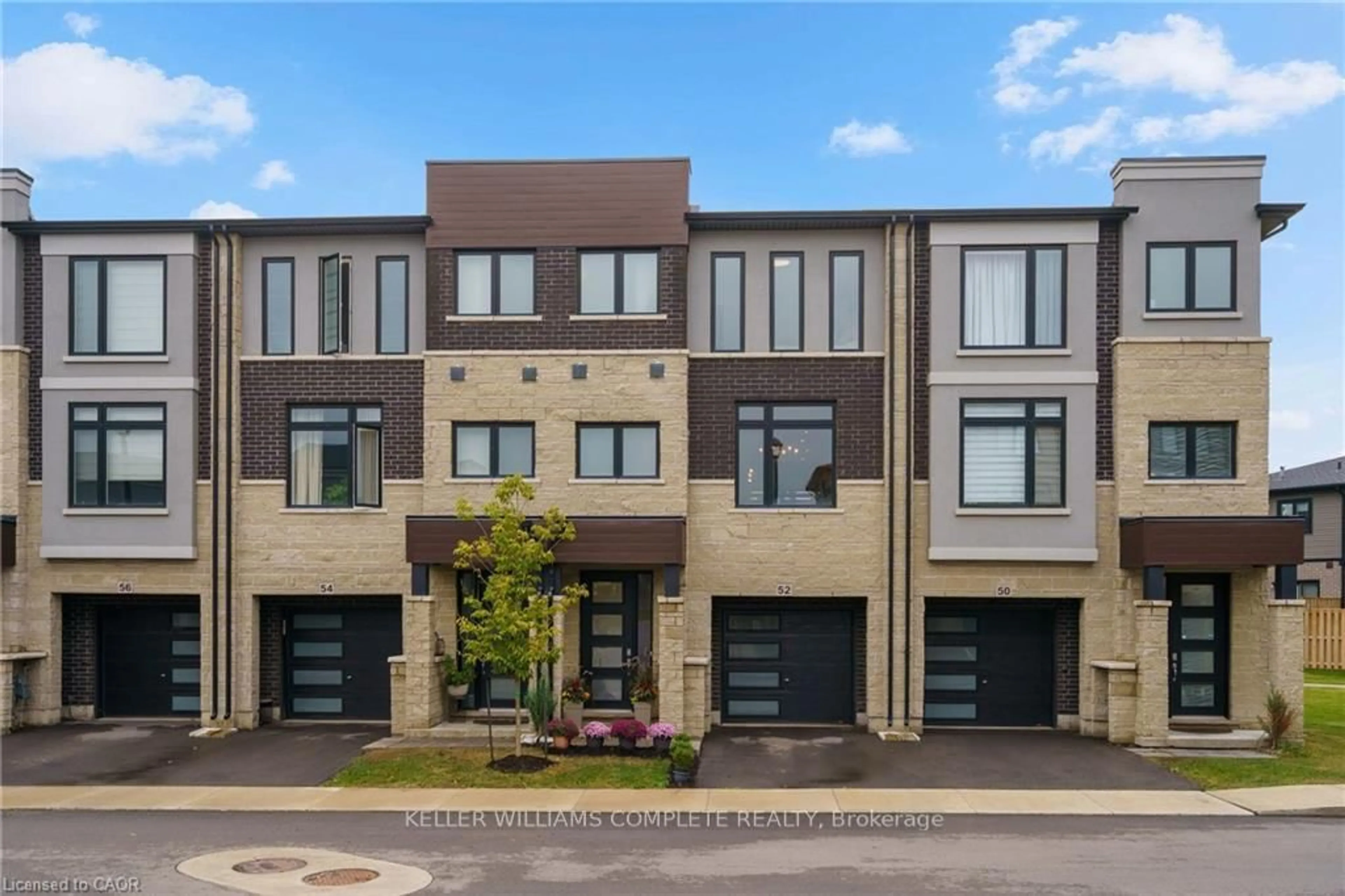 Home with brick exterior material, street for 52 CADWELL Lane, Hamilton Ontario L9C 0E8